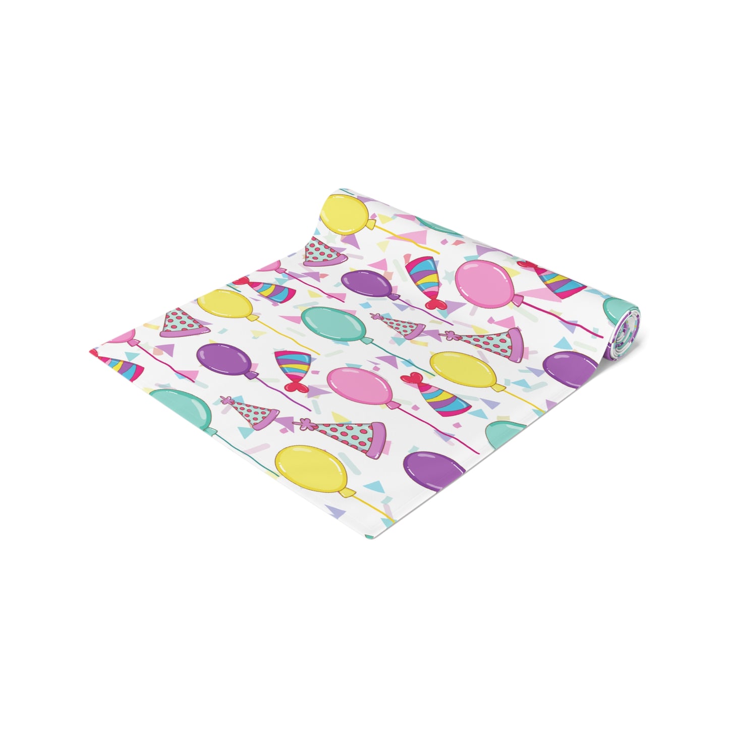 Rolled table runner with birthday hats, confetti and purple, yellow, blue and pink balloons design on a white background
