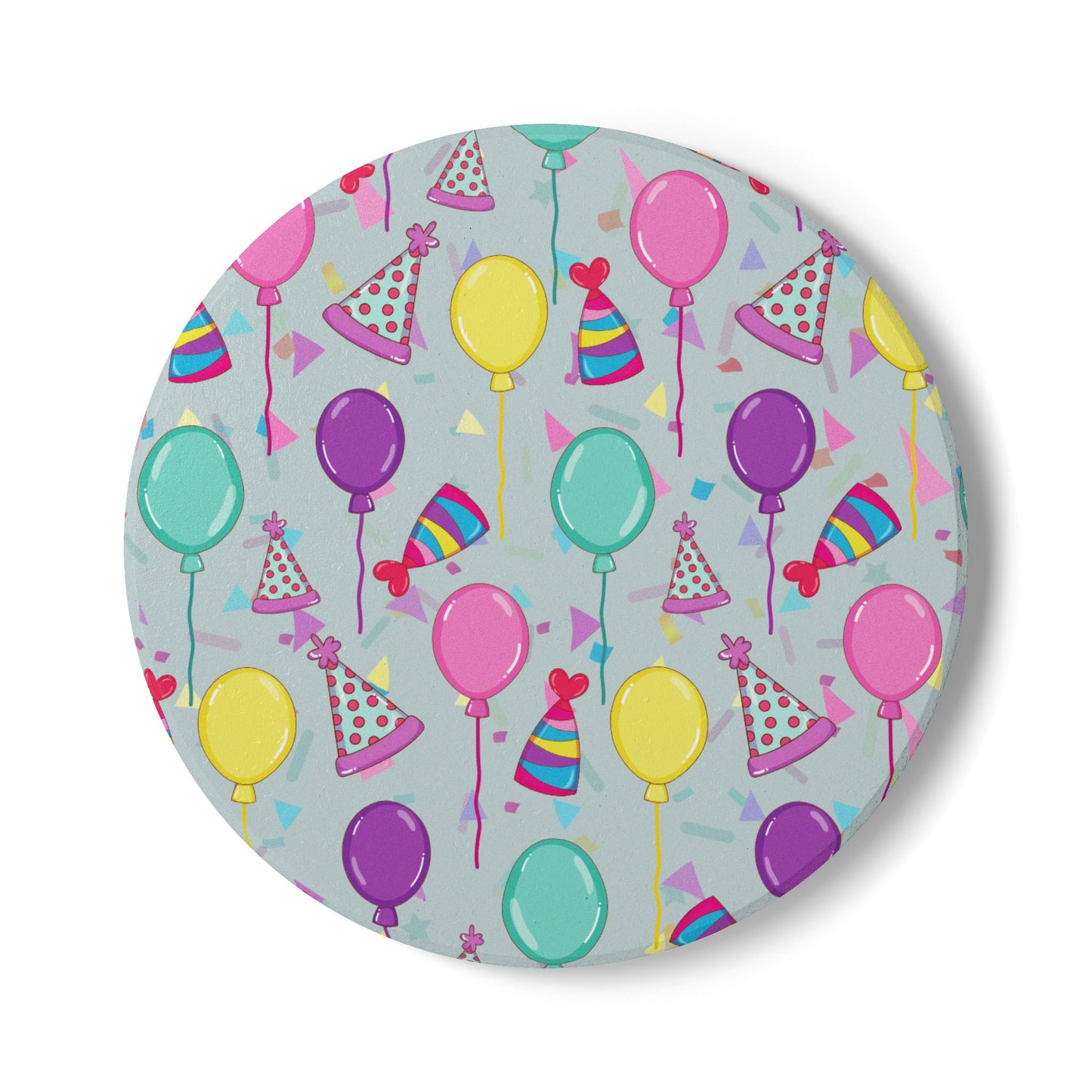 Happy Birthday round ceramic tile coaster with with birthday hats, confetti and balloons pattern with a blue-green light cyan background on white background