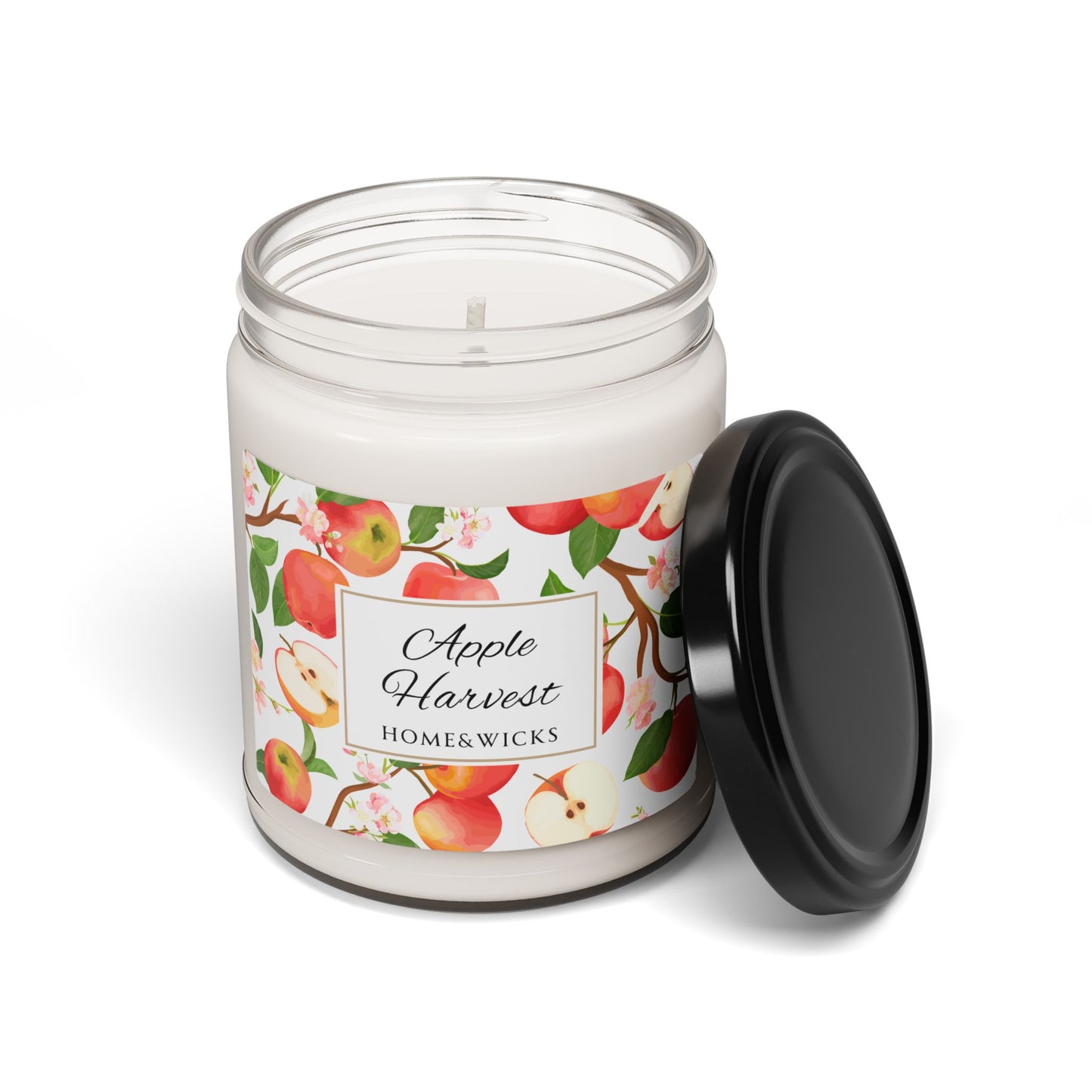 Candle jar with 'Apple Harvest' label on a white background