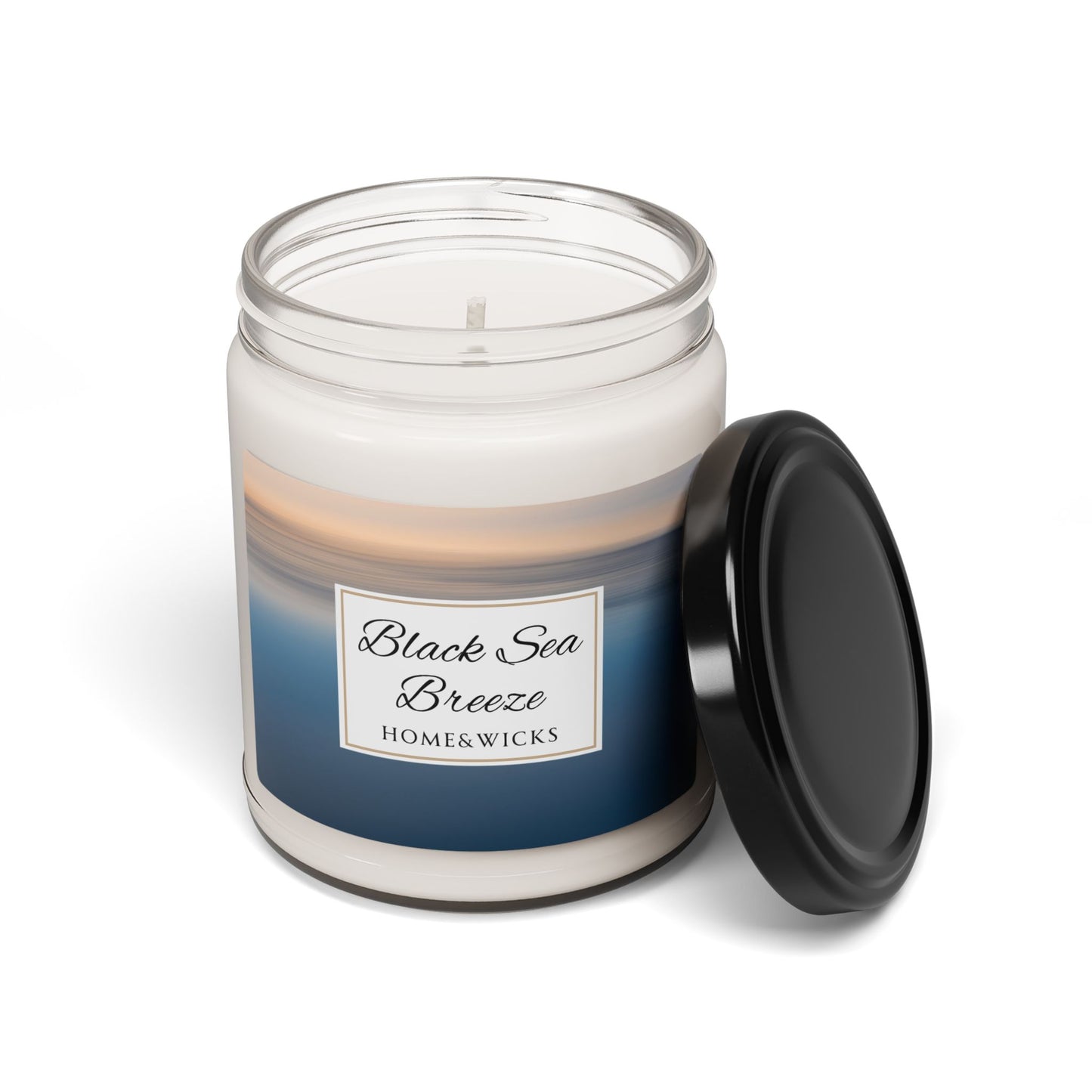 Candle jar labeled 'Black Sea Breeze' by Home & Wicks on a white background
