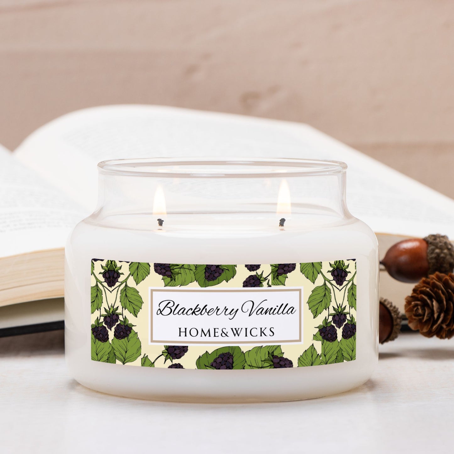Homewicks Blackberry Vanilla candle in a glass jar with a decorative label on a neutral background.