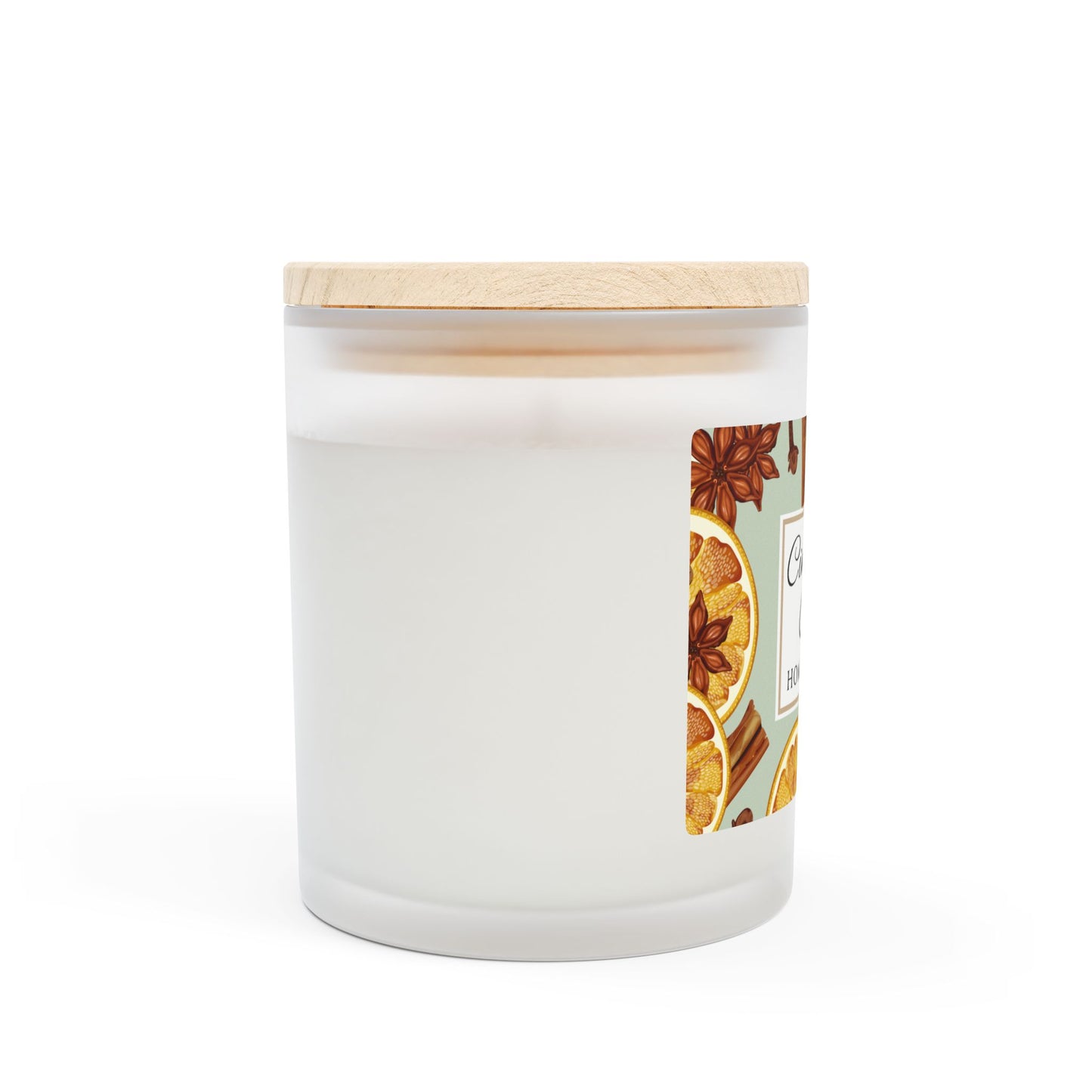 White candle with a wooden lid and decorative label on a white background