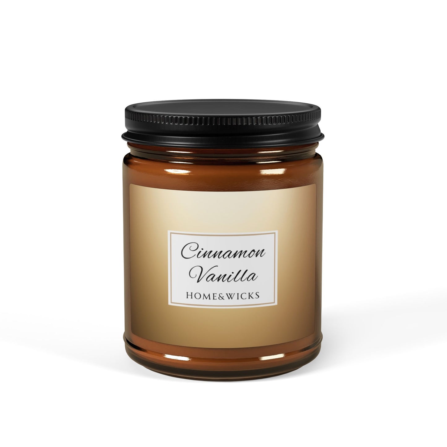Home and wicks cinnamon vanilla candle in a amber jar with a black lid on a white background