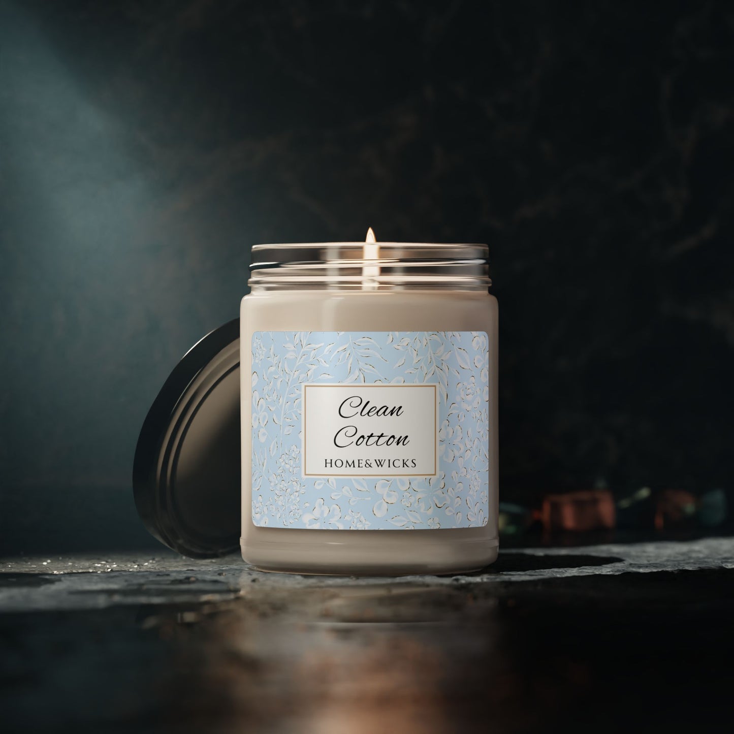 Homewares candle labeled 'Clean Cotton' by Homekwick on a dark background