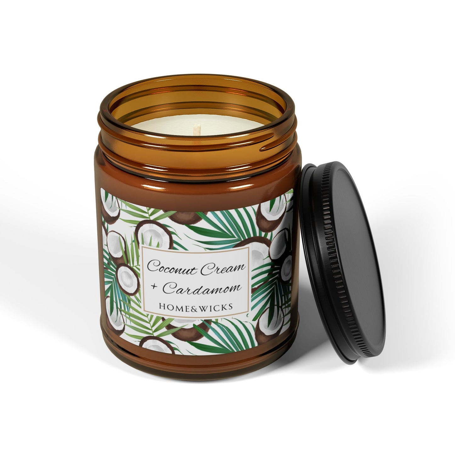 Candle in an amber jar with a decorative label on a white background