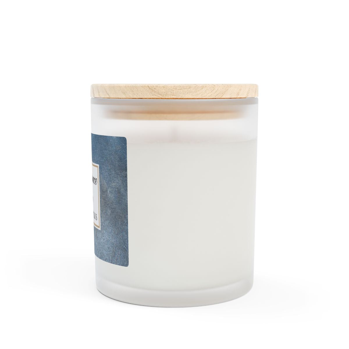 White candle with a wooden lid on a white background