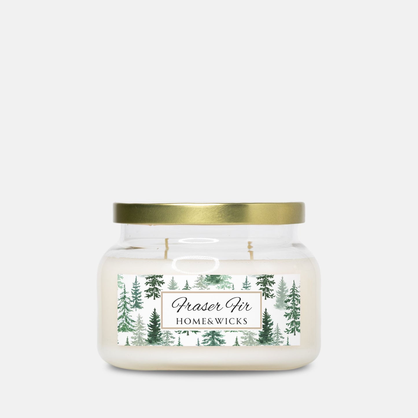 Candle jar with a gold lid and 'Fraser Fir Home & Wicks' label on a white background