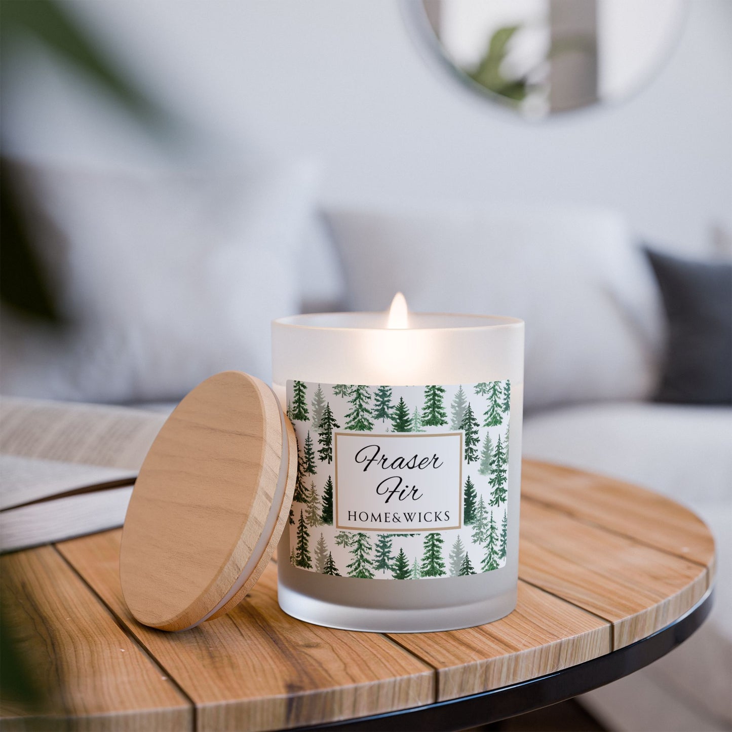Candle with a forest design Fraser Fir label on a wooden table