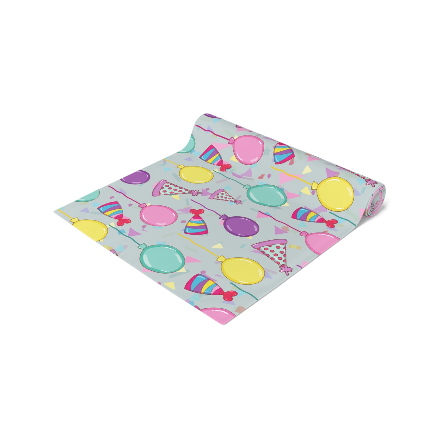 Table runner roll with colorful birthday party hats, confetti and balloons pattern on a white background