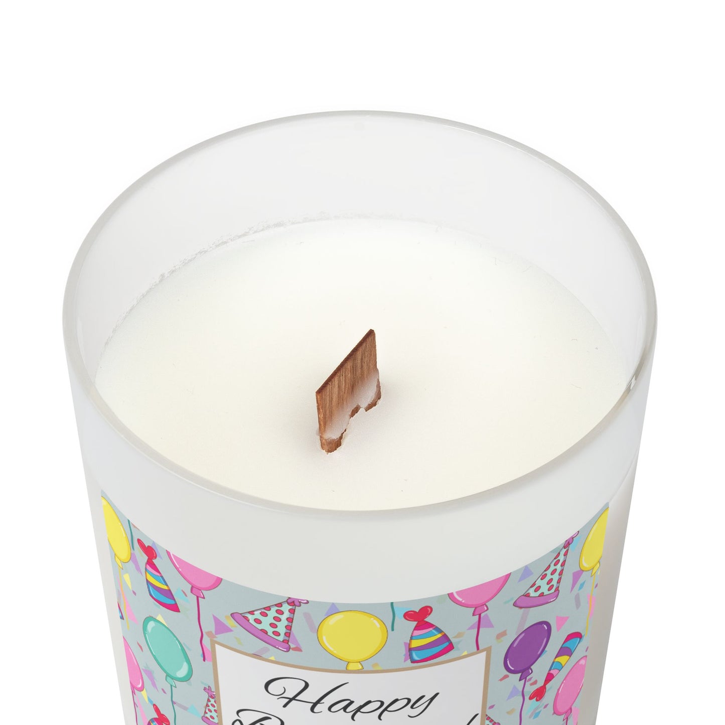 Wood wick candle with a 'Happy Birthday' label featuring balloons and party hats with maple wood lid on a white background.