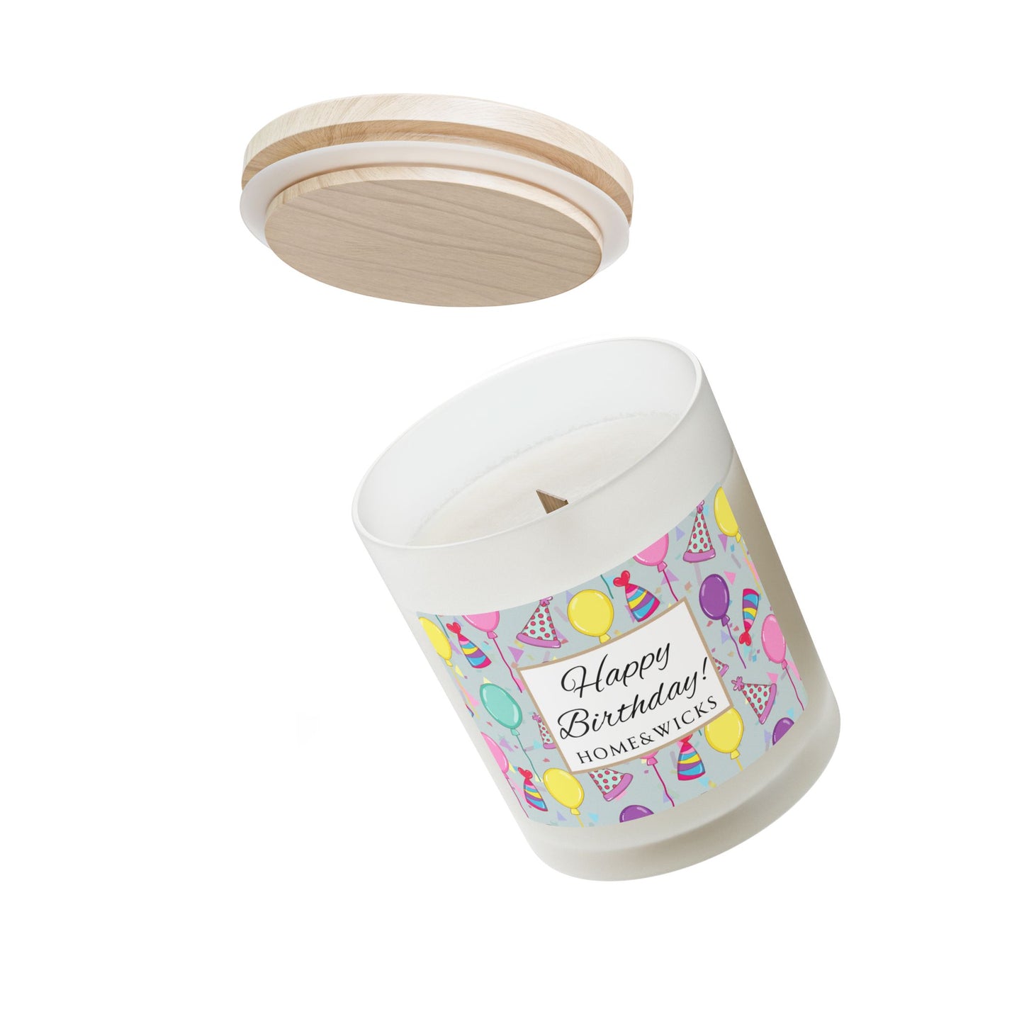 Wood wick candle with a 'Happy Birthday' label featuring balloons and party hats with maple wood lid on a white background.