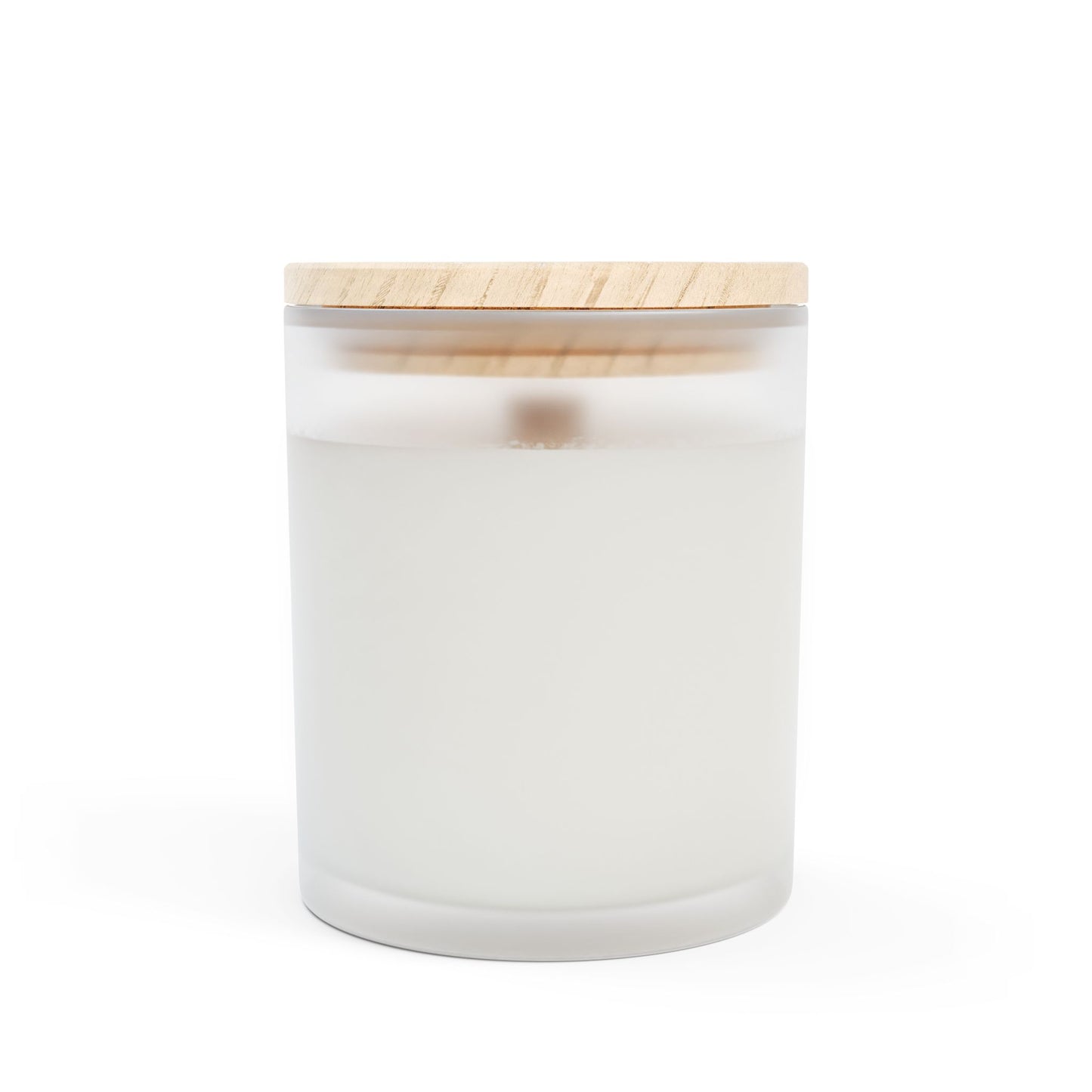 White candle in a glass jar with a wooden lid on a white background