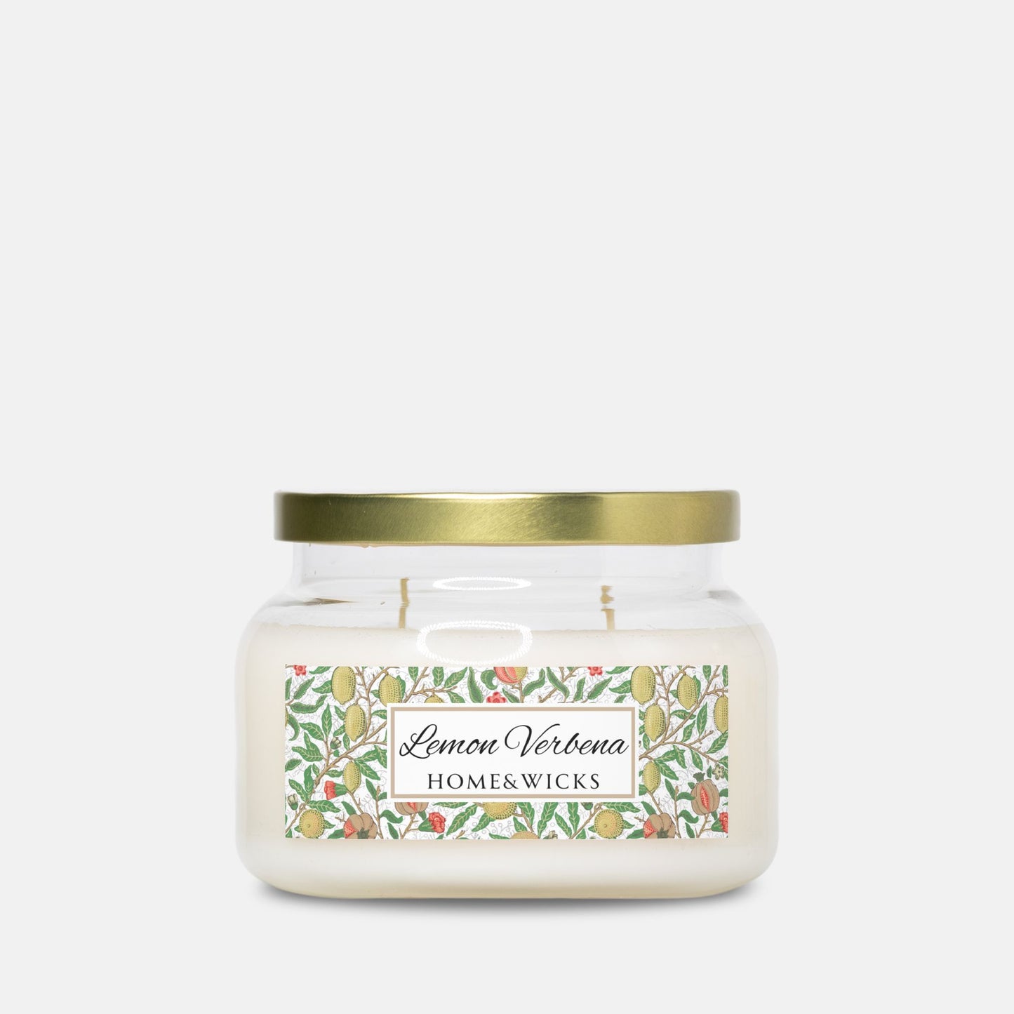 Double wick apothecary candle jar with 'Lemon Verbena' label on a white background