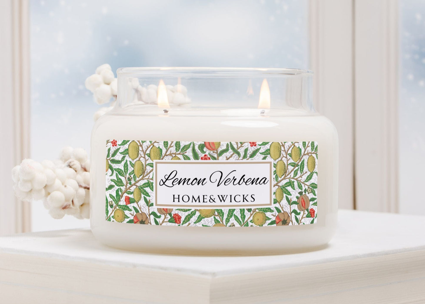 Candle with 'Lemon Verbena' label on a decorative surface
