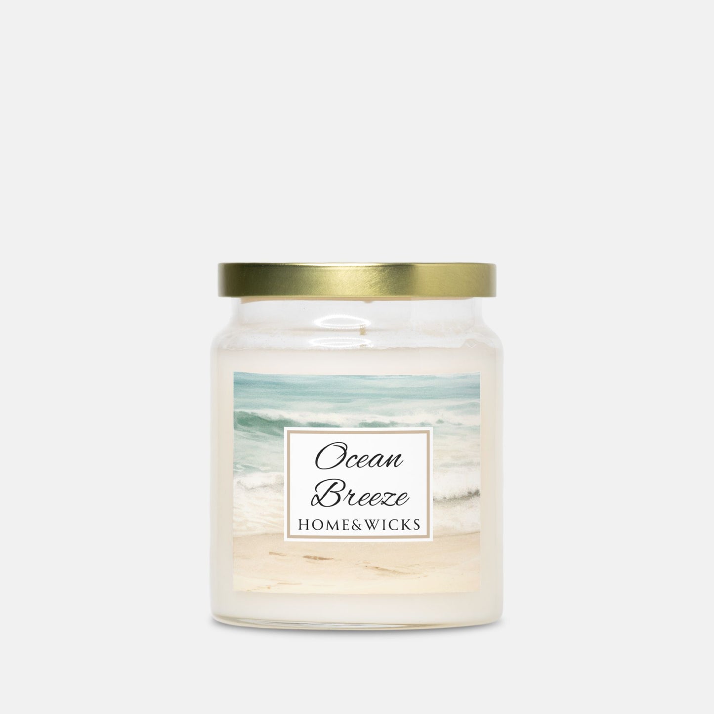 Candle jar labeled 'Ocean Breeze' by Home & Wicks on a white background