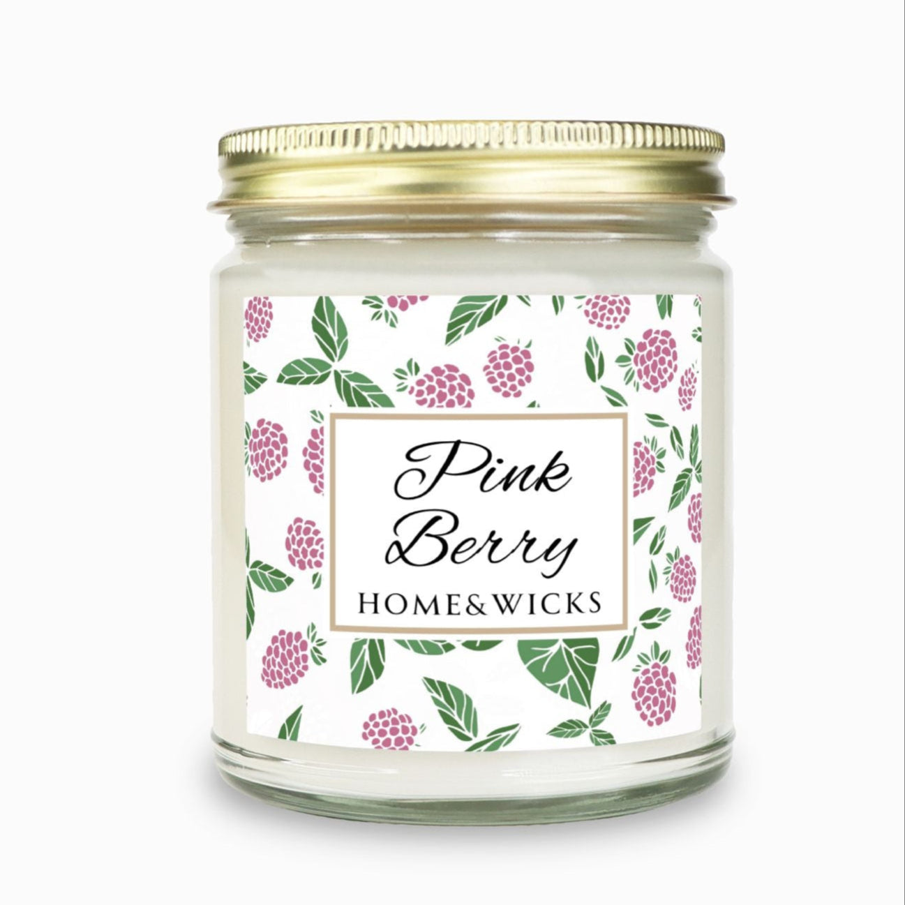 Pink Berry clear candle jar with gold lid with a decorative label featuring pink berries and green leaves on a white background by Home & Wicks