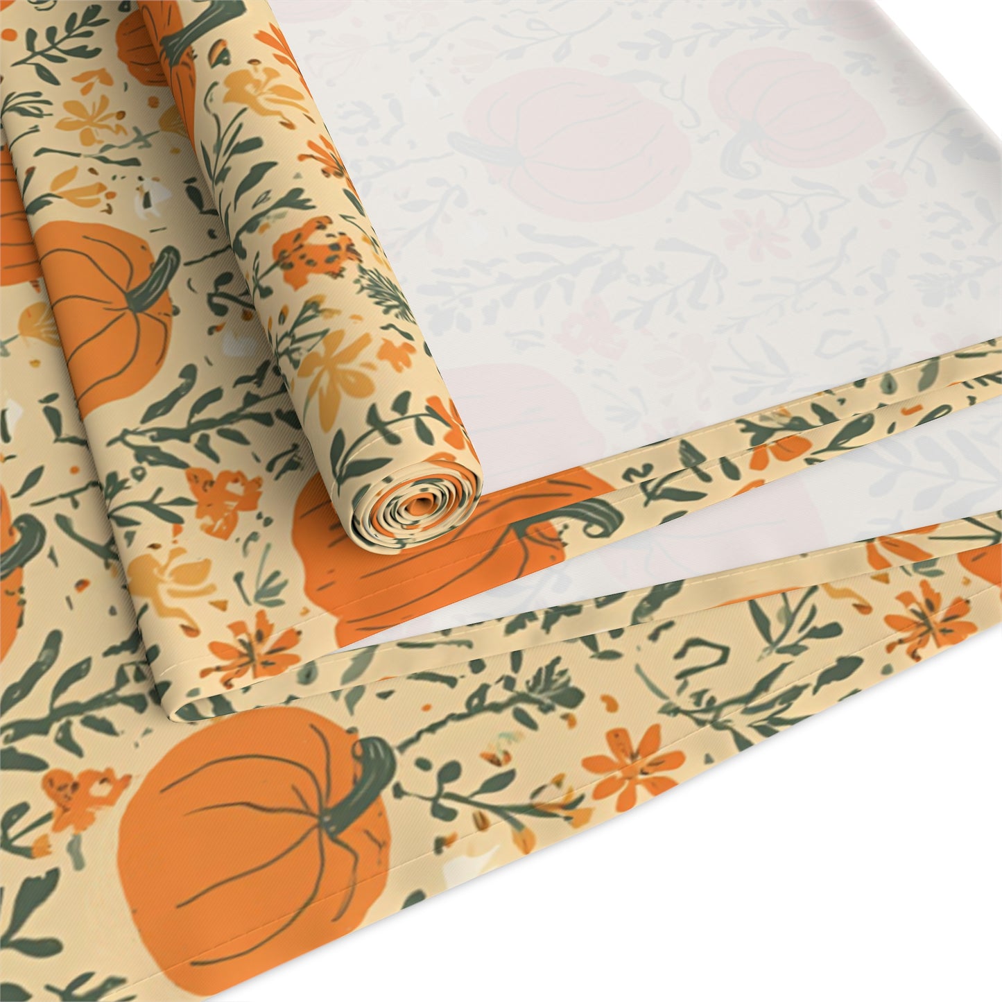 Our polyester Pumpkin Garden table runner has an orange pumpkin and flowers table runner design and is rolled up on a white background