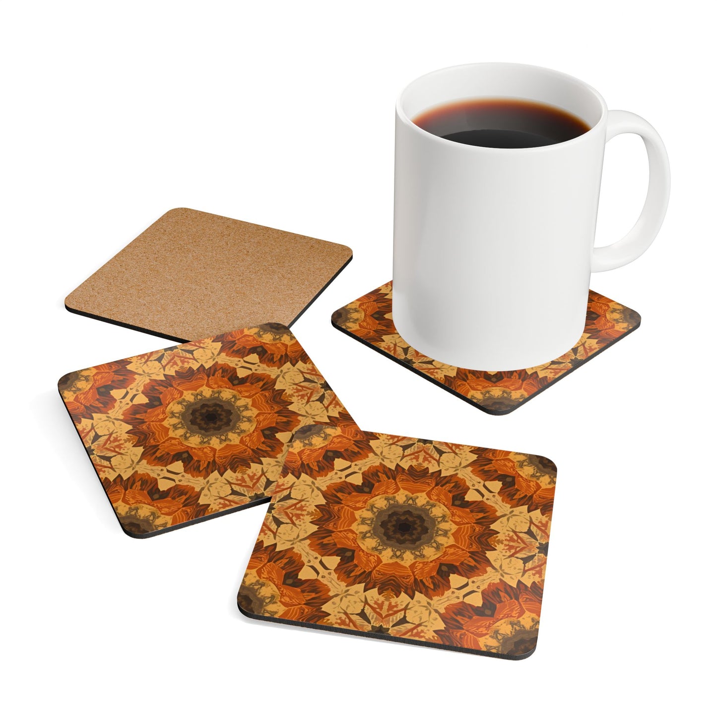 Set of four tye-dye orange, yellow, gary floral coasters with a white mug on a white background