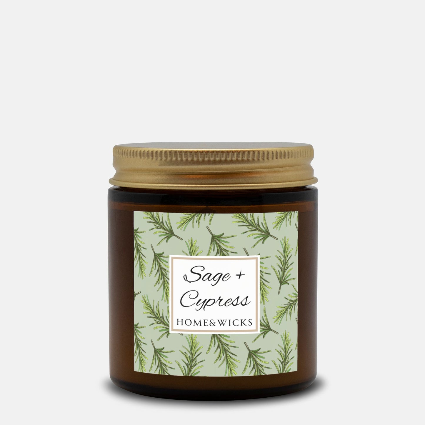 Sage & Cypress candle in a 4 oz. amber glass jar with a gold lid and 'Sage + Cypress' label on a white background by Home & Wicks