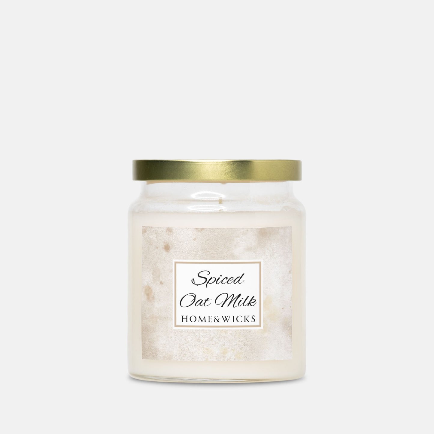 Candle jar labeled 'Spiced Oat Milk' by HOME&WICKS on a white background