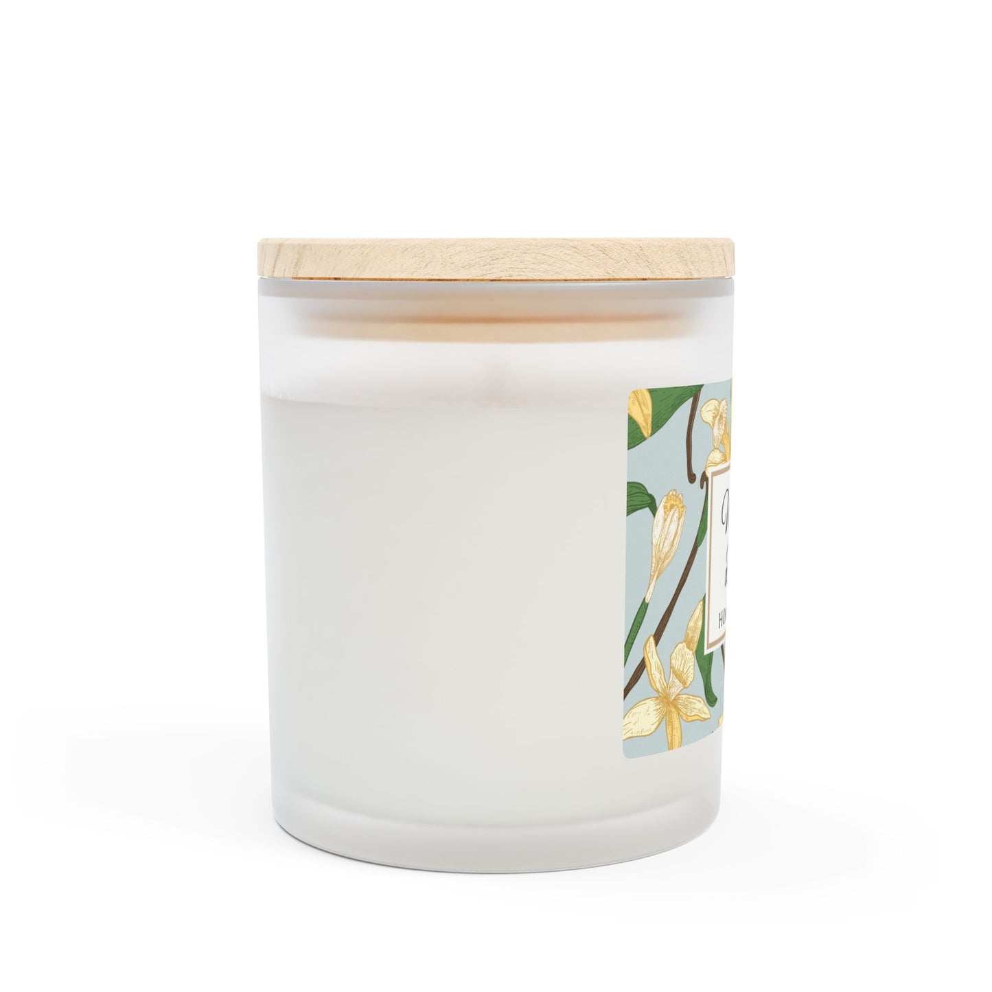 Candle with wooden lid and floral design on a white background