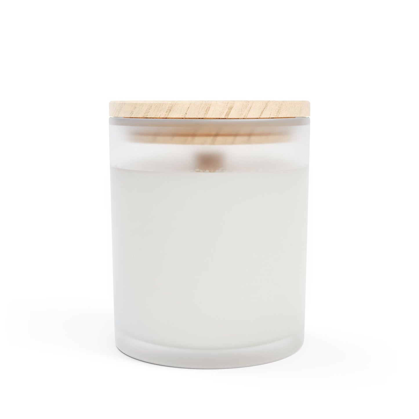 White candle in a glass jar with a wooden lid on a white background