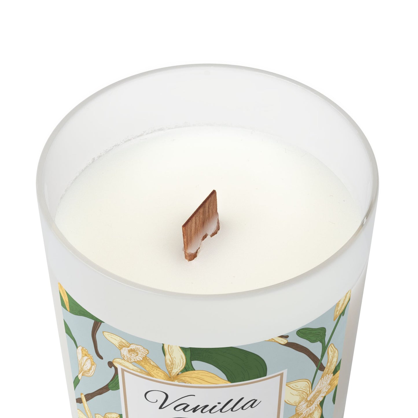 Candle with vanilla bean label and floral design on a white background