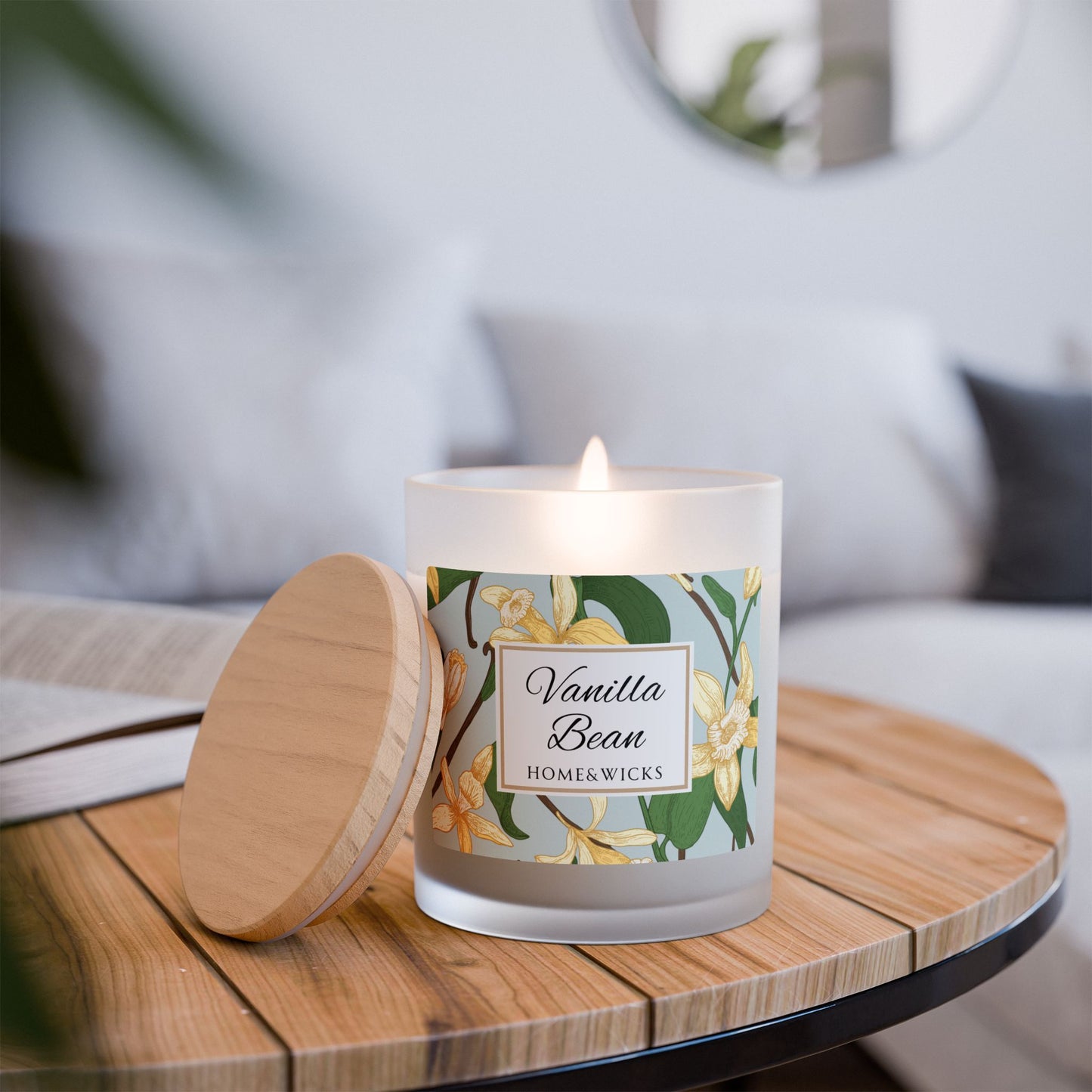 Vanilla Bean candle with a floral label on a wooden table