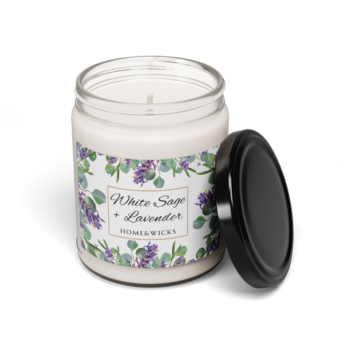 Candle jar with white sage lavender floral label and black lid on a white background