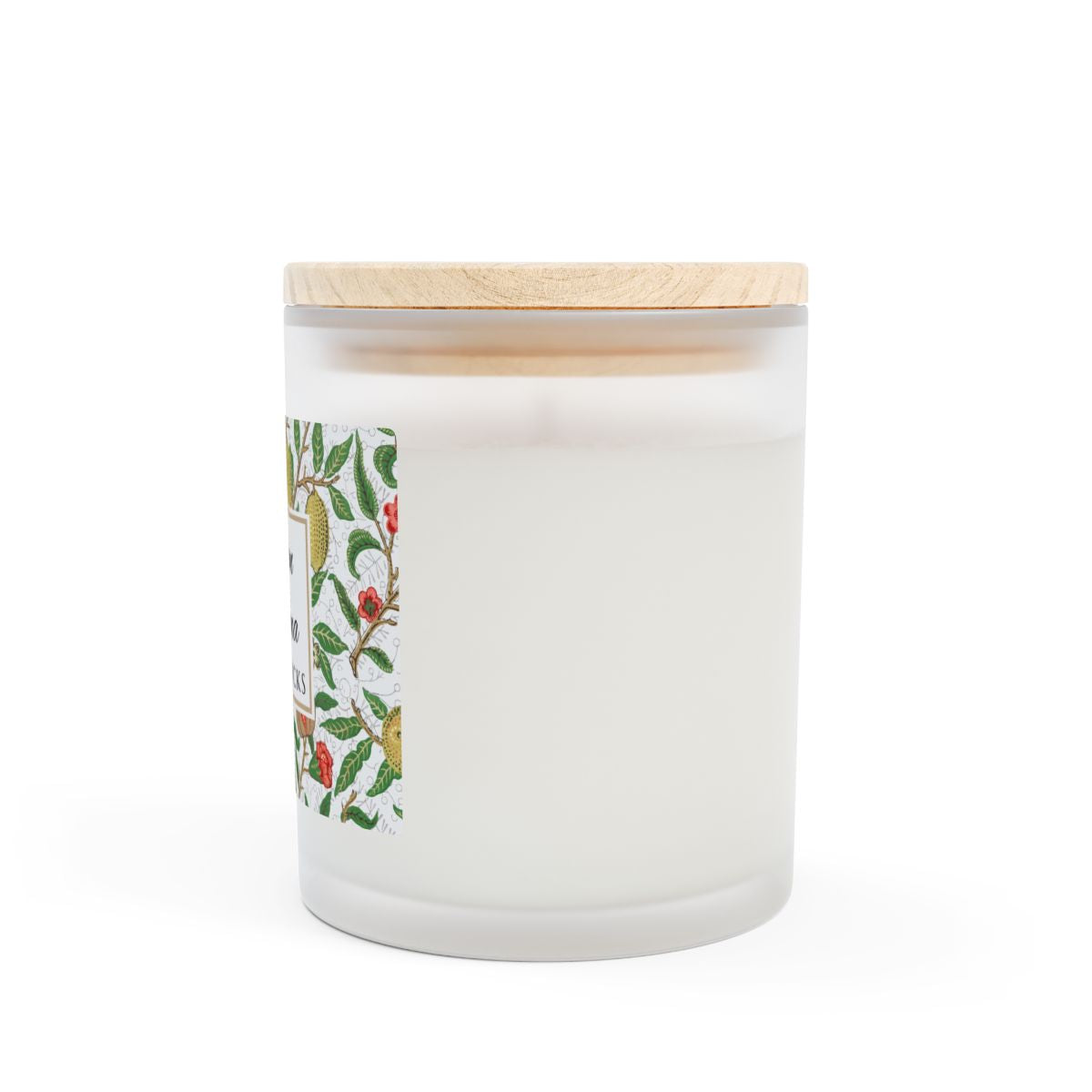 Side view of wood wick candle with decorative Fruit design by William Morris label and wooden lid on a white background