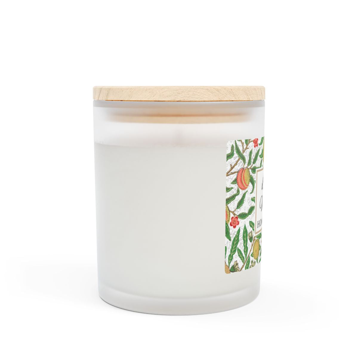 Side view of wood wick white frosted candle with a wooden lid and Lemon Verbena floral "Fruit" design by William Morris on a white background