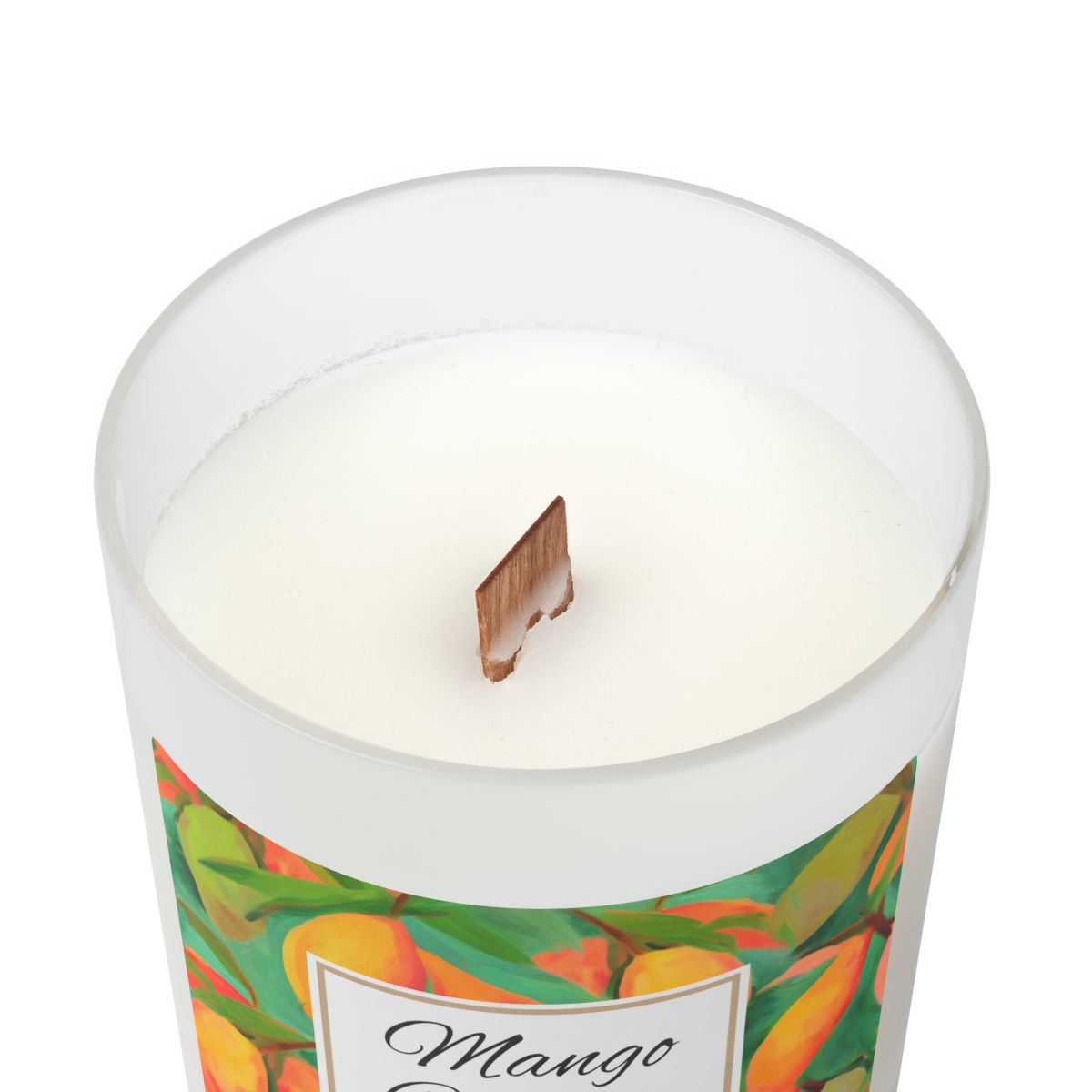 Wood wick candle with a green and orange mango coconut label on a frosted glass candle jar on a white background by Home & Wicks