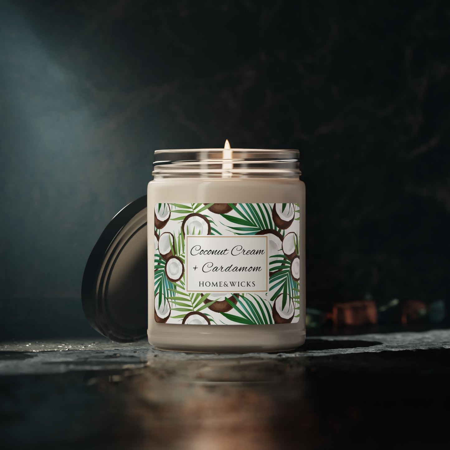 Homewicks coconut cream and cardamom candle with a decorative label on a dark background
