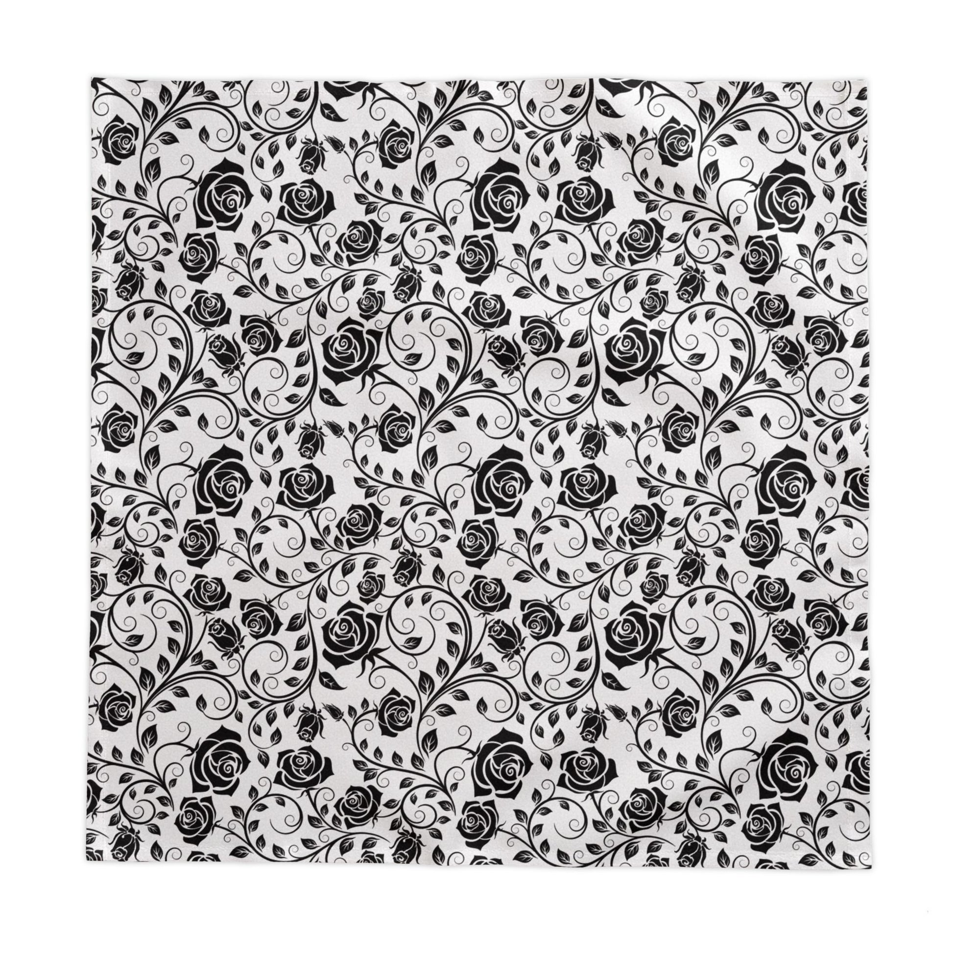 Black floral pattern square tablecloth on a white background