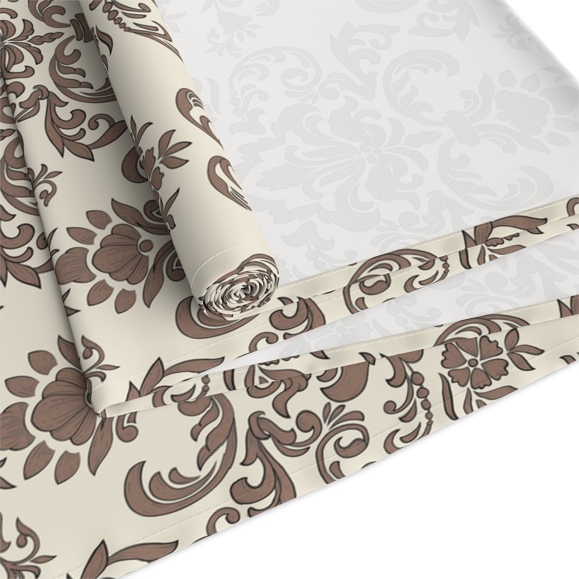 Roll of Baroque Mocha table runner with brown and beige damask floral pattern on a white background