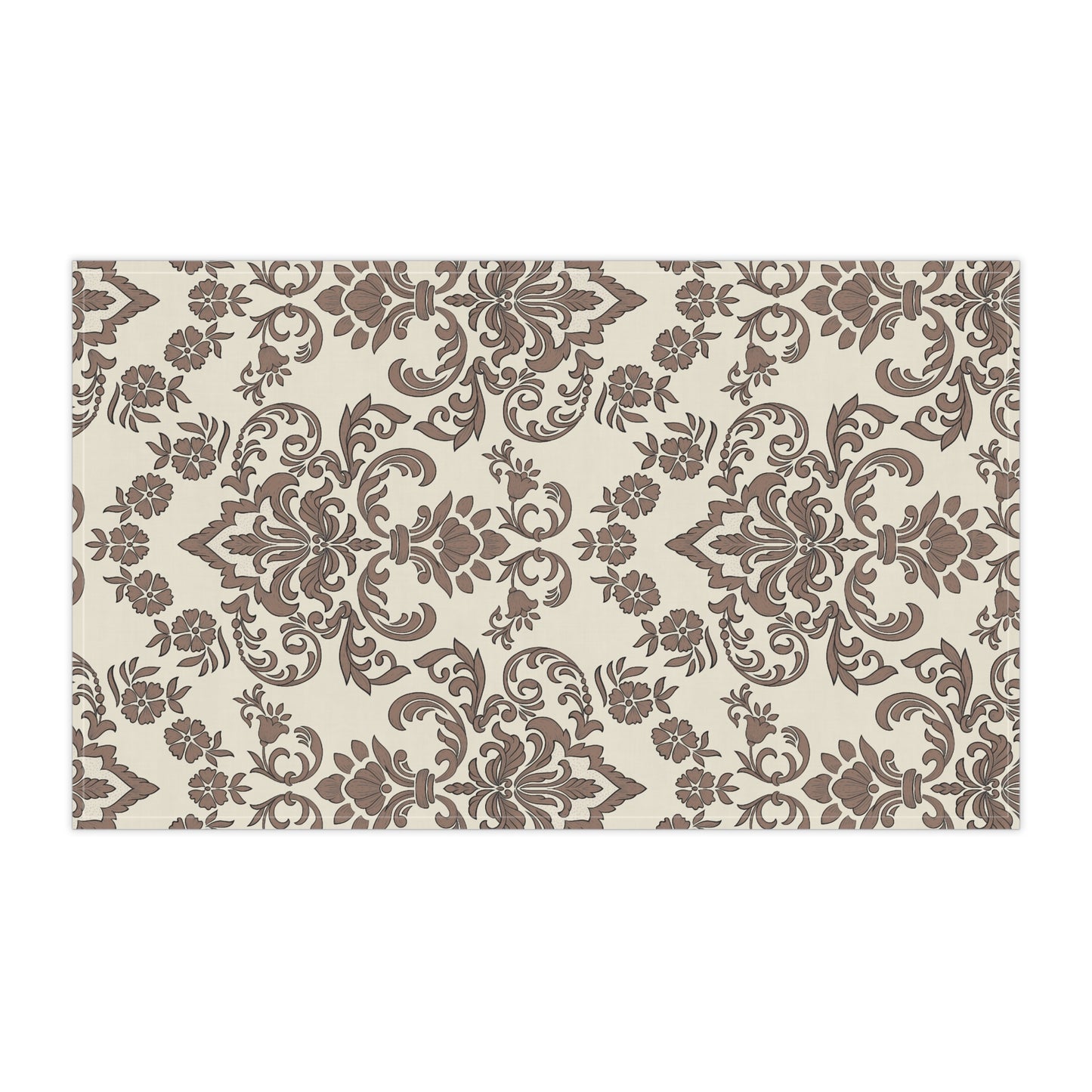 Decorative tea towel with brown floral pattern on a white background