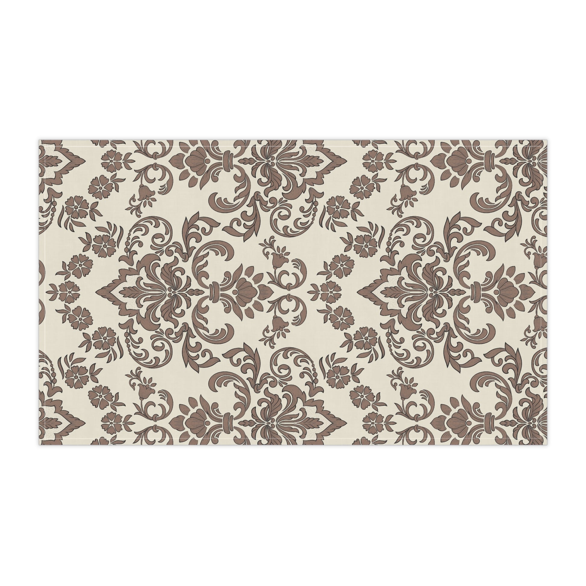 Decorative tea towel with brown floral pattern on a white background