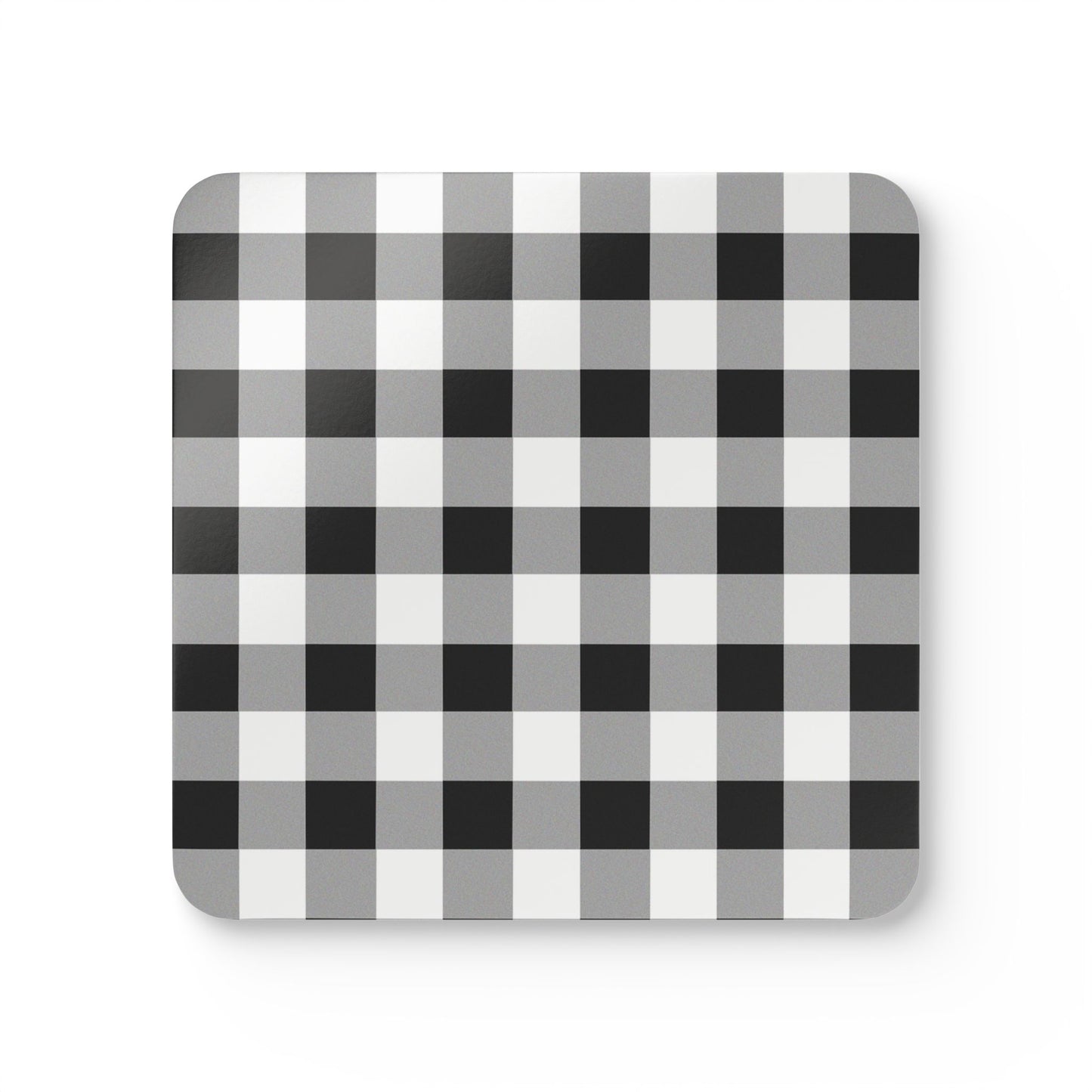 Square coaster with black and white checkered gingham pattern on a white background