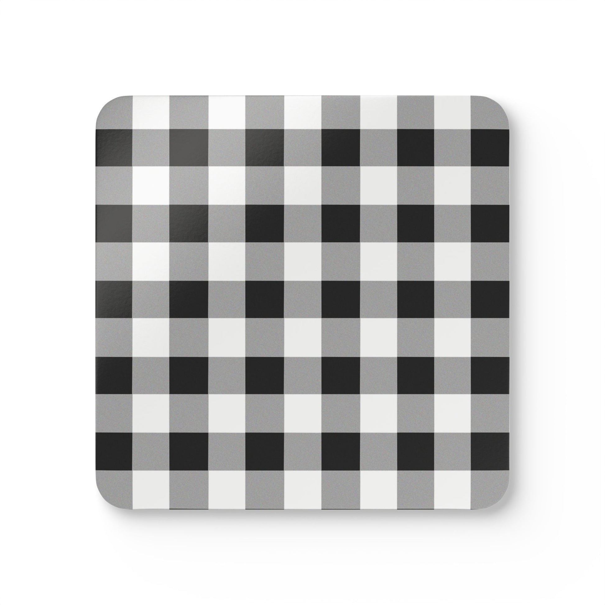 Square coaster with black and white checkered gingham pattern on a white background