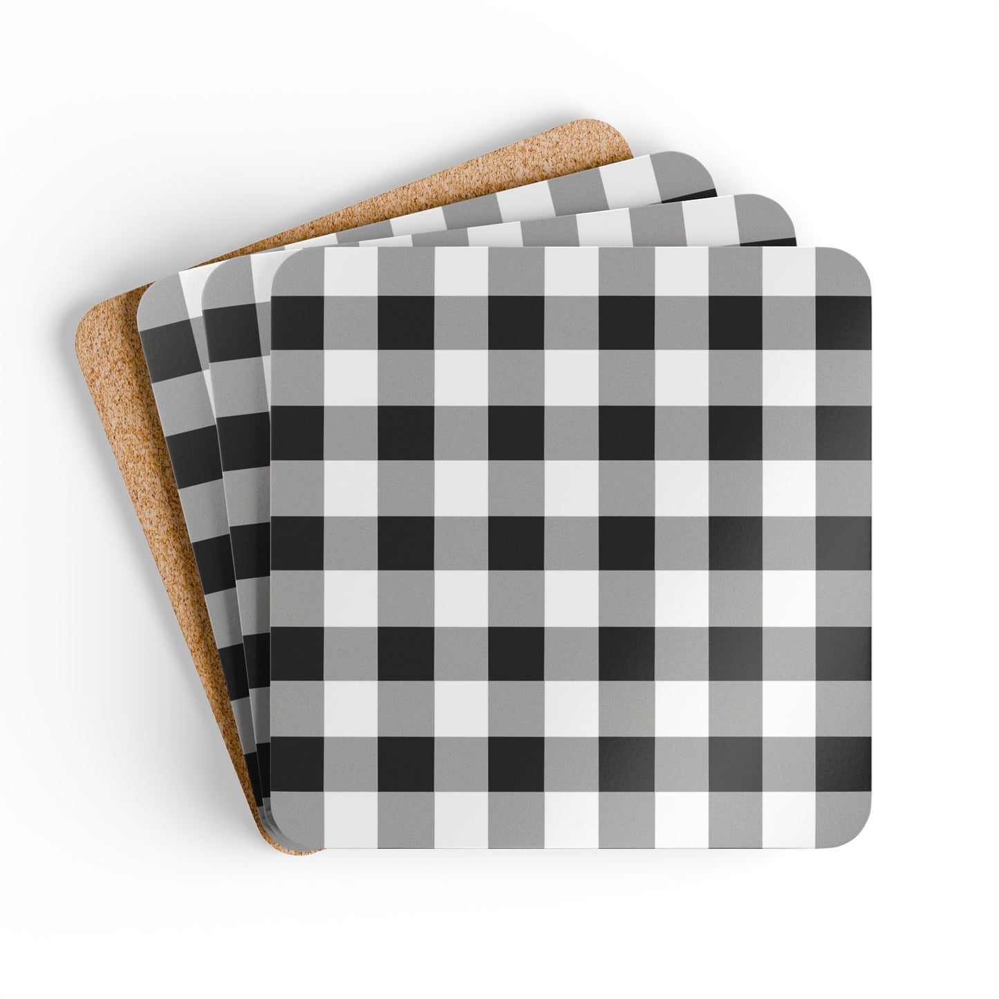 Set of four black and white checkered gingham coasters with cork backing on a white background