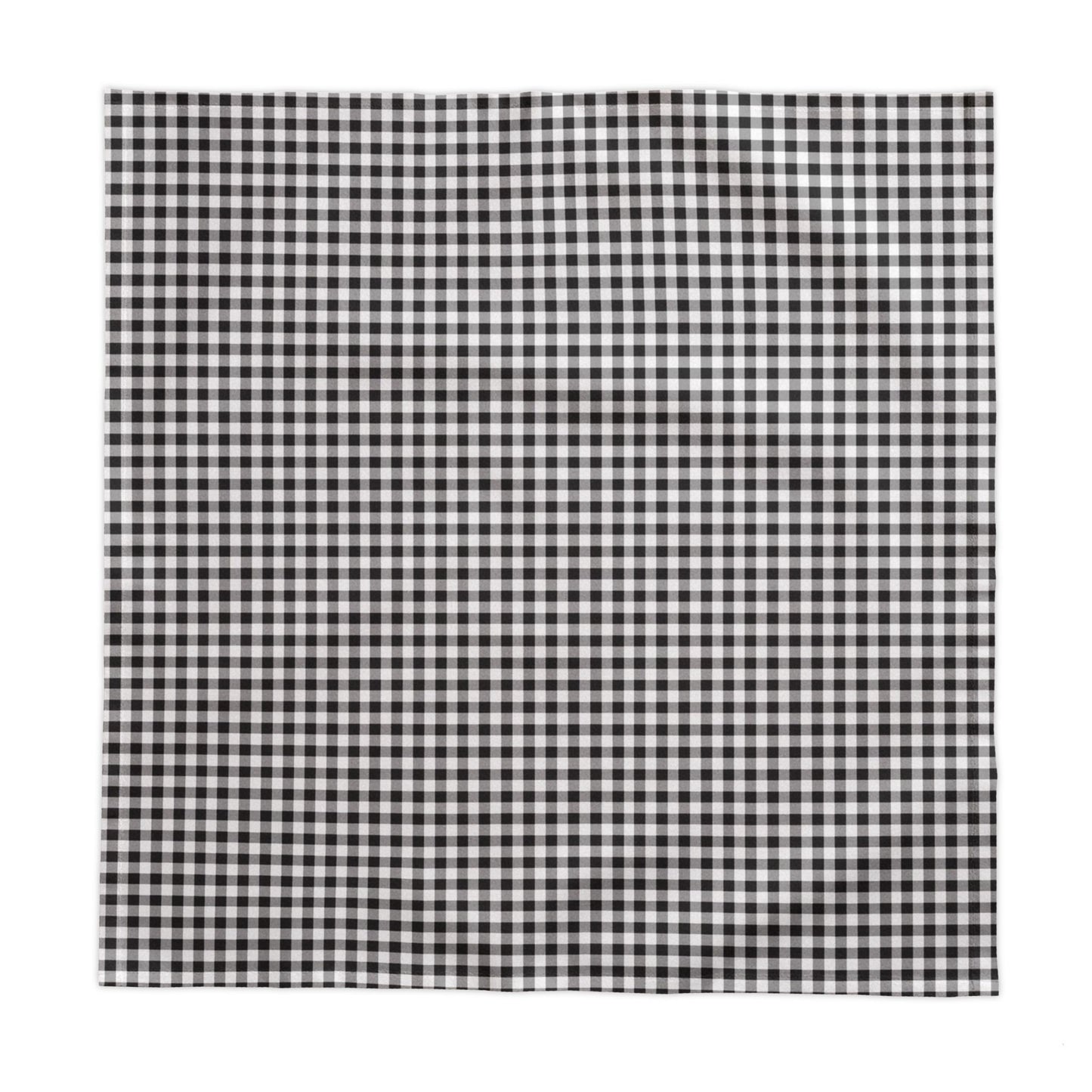 Black and white checkered gingham patterned square tablecloth on a white background