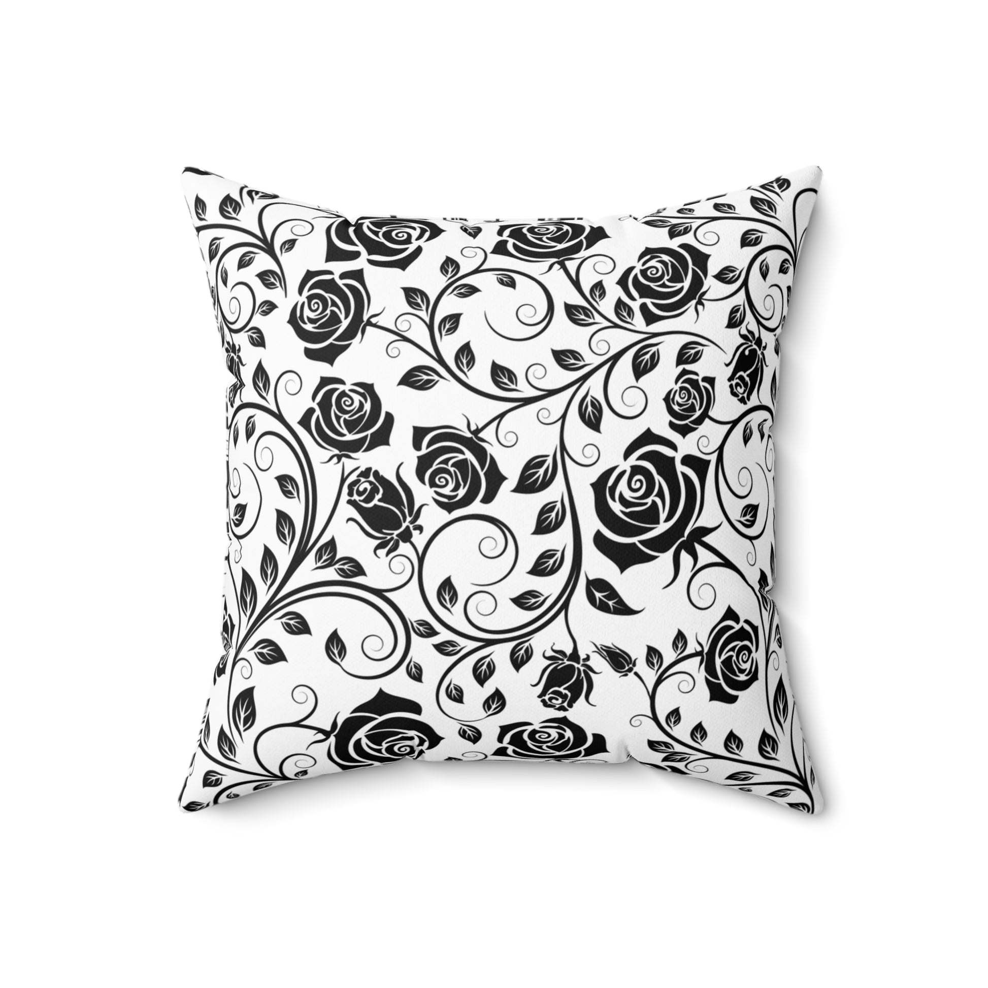 Decorative pillow with black floral pattern on a white background