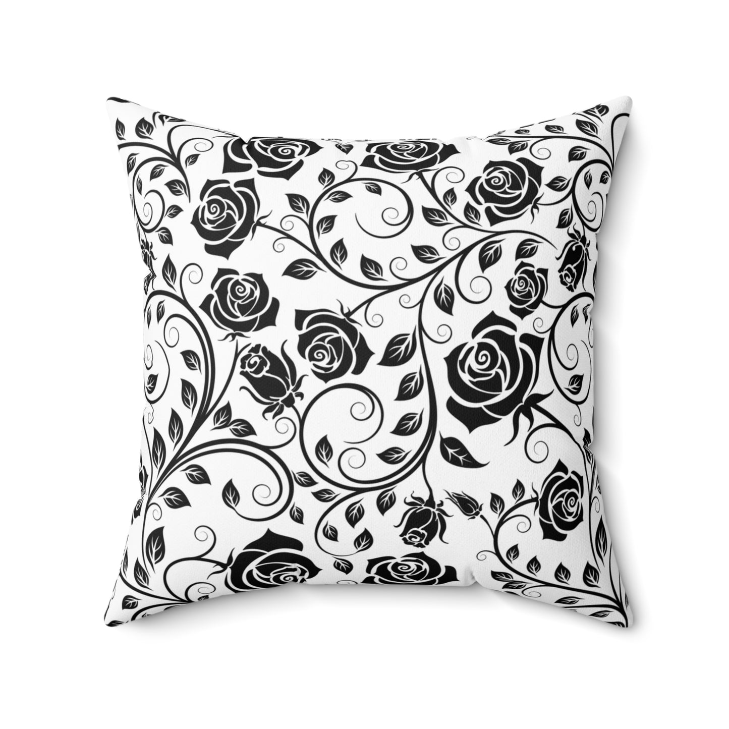 Decorative pillow with black rose pattern on a white background