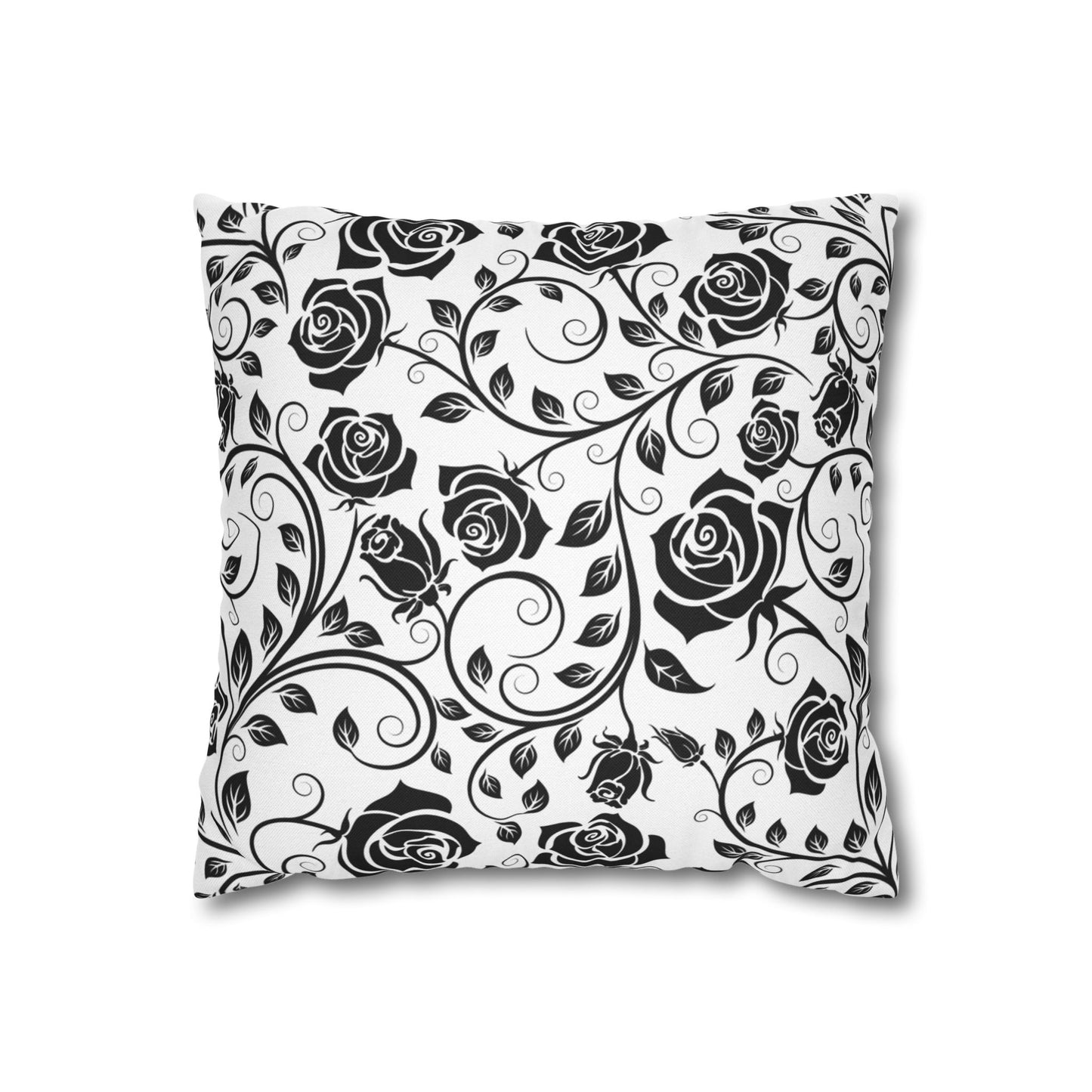 Decorative pillow with black rose pattern on a white background