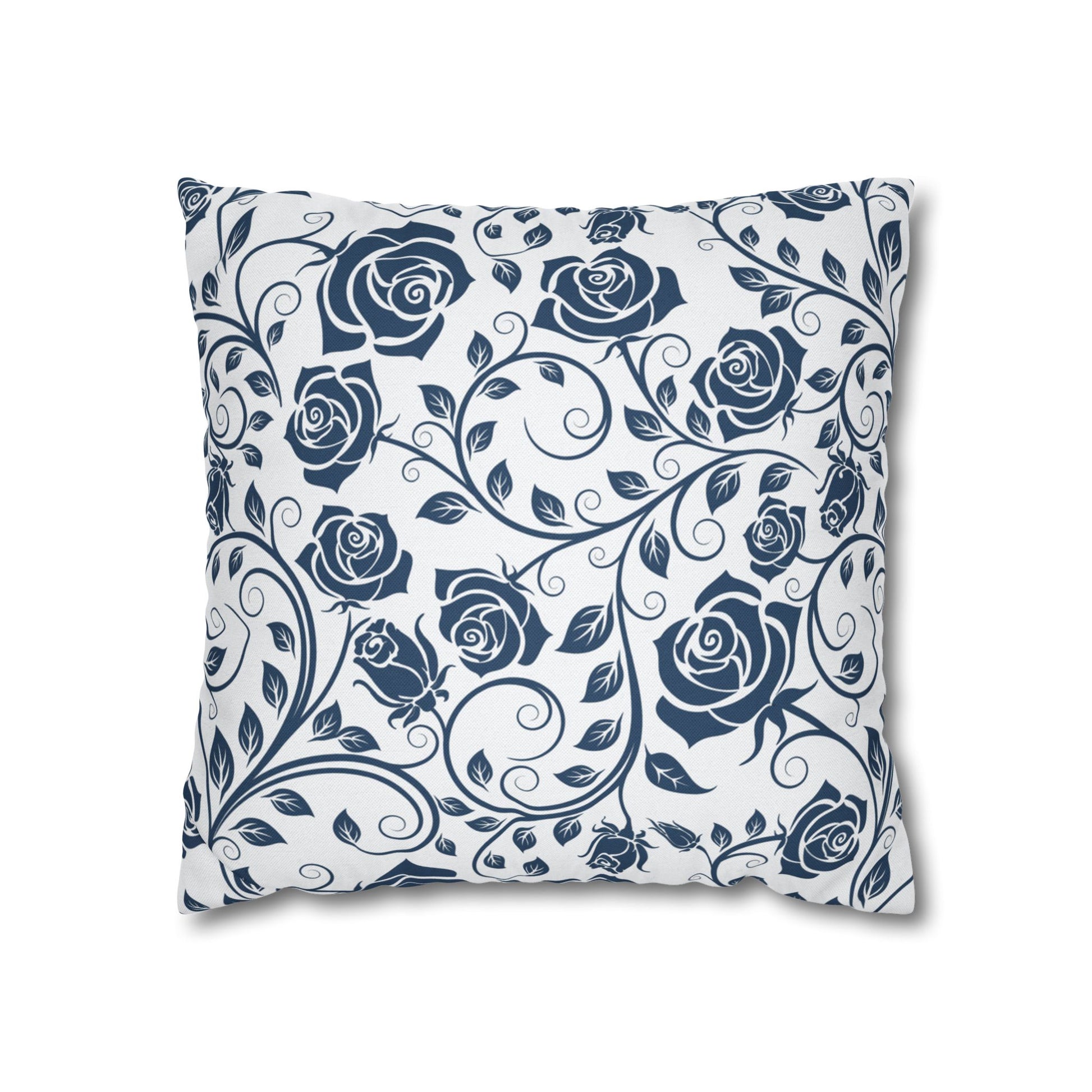Decorative pillow with blue rose pattern on a white background