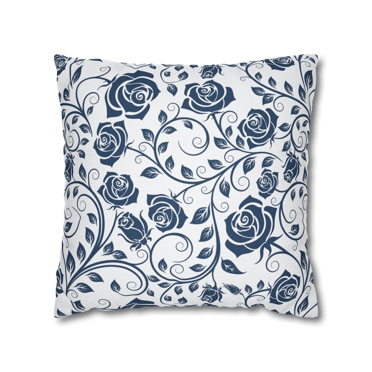 Decorative pillow with blue rose pattern on a white background