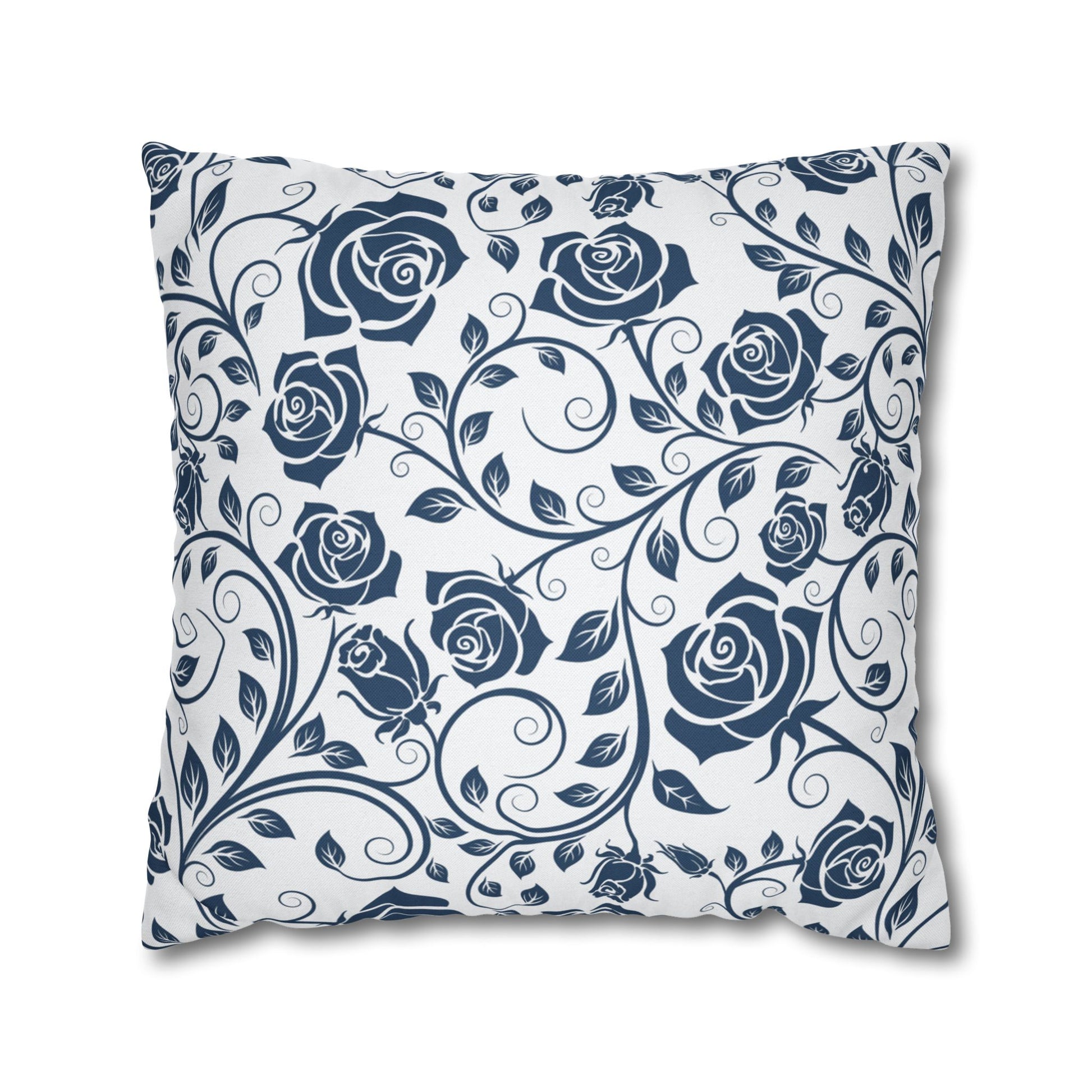 Decorative pillow with blue rose pattern on a white background