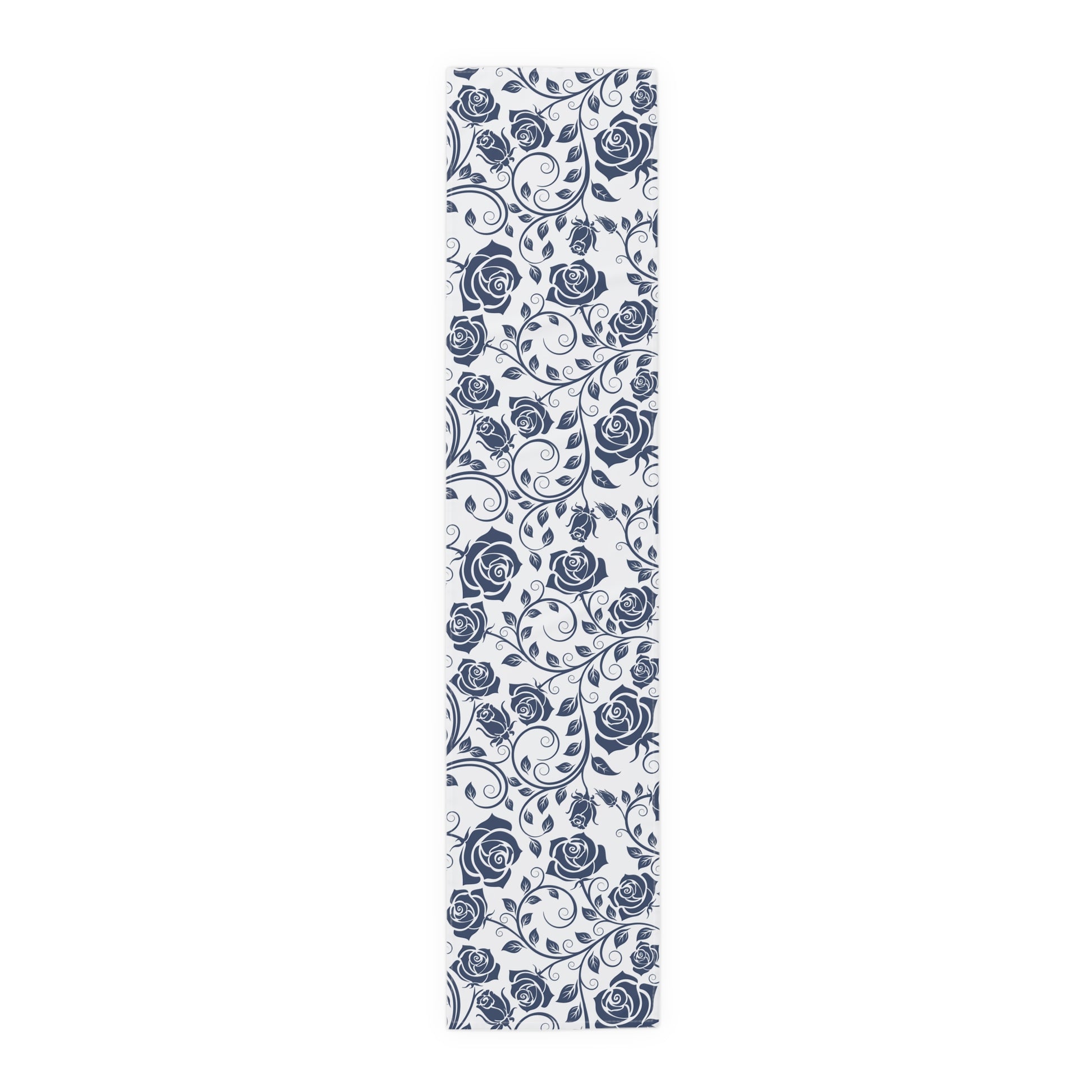 Table runner with blue floral pattern on a white background