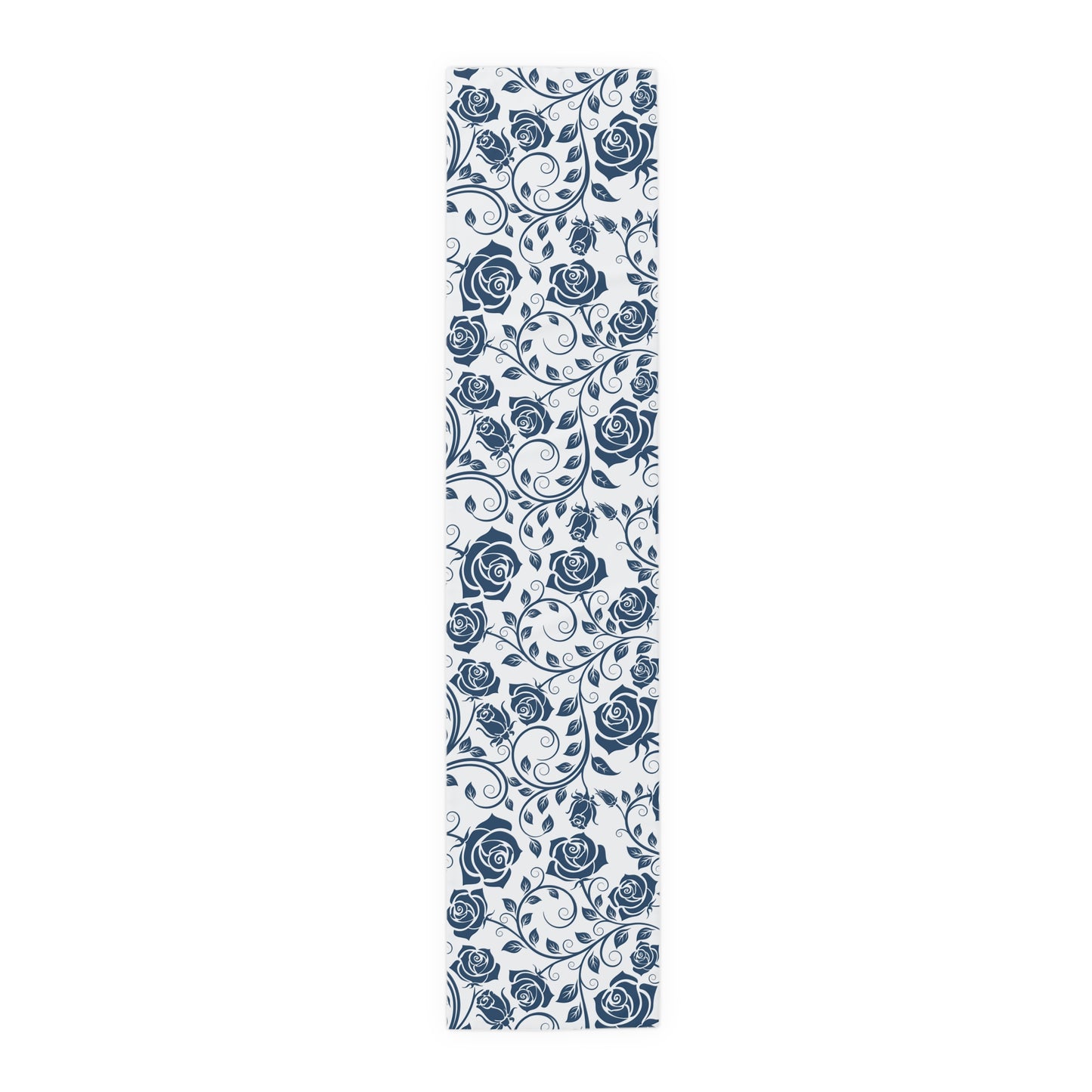 Table runner with blue floral pattern on a white background