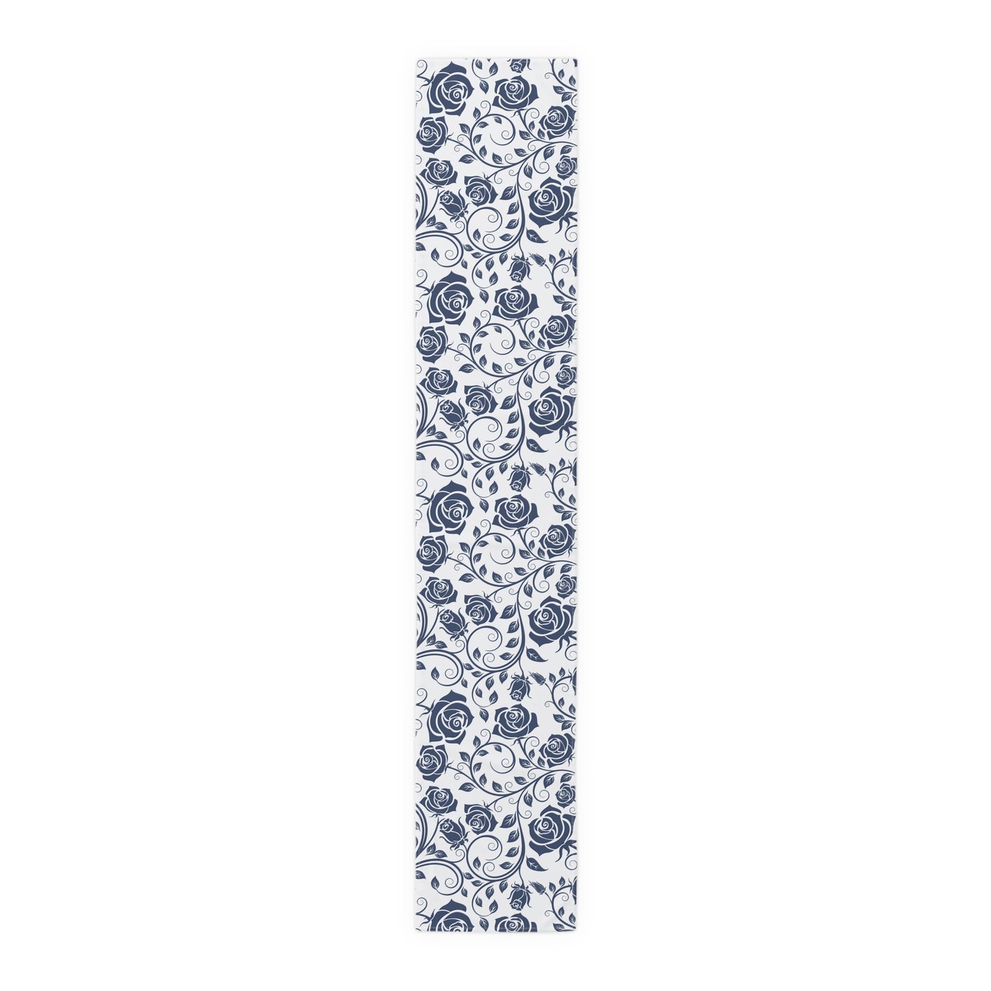 Table runner with blue floral pattern on a white background